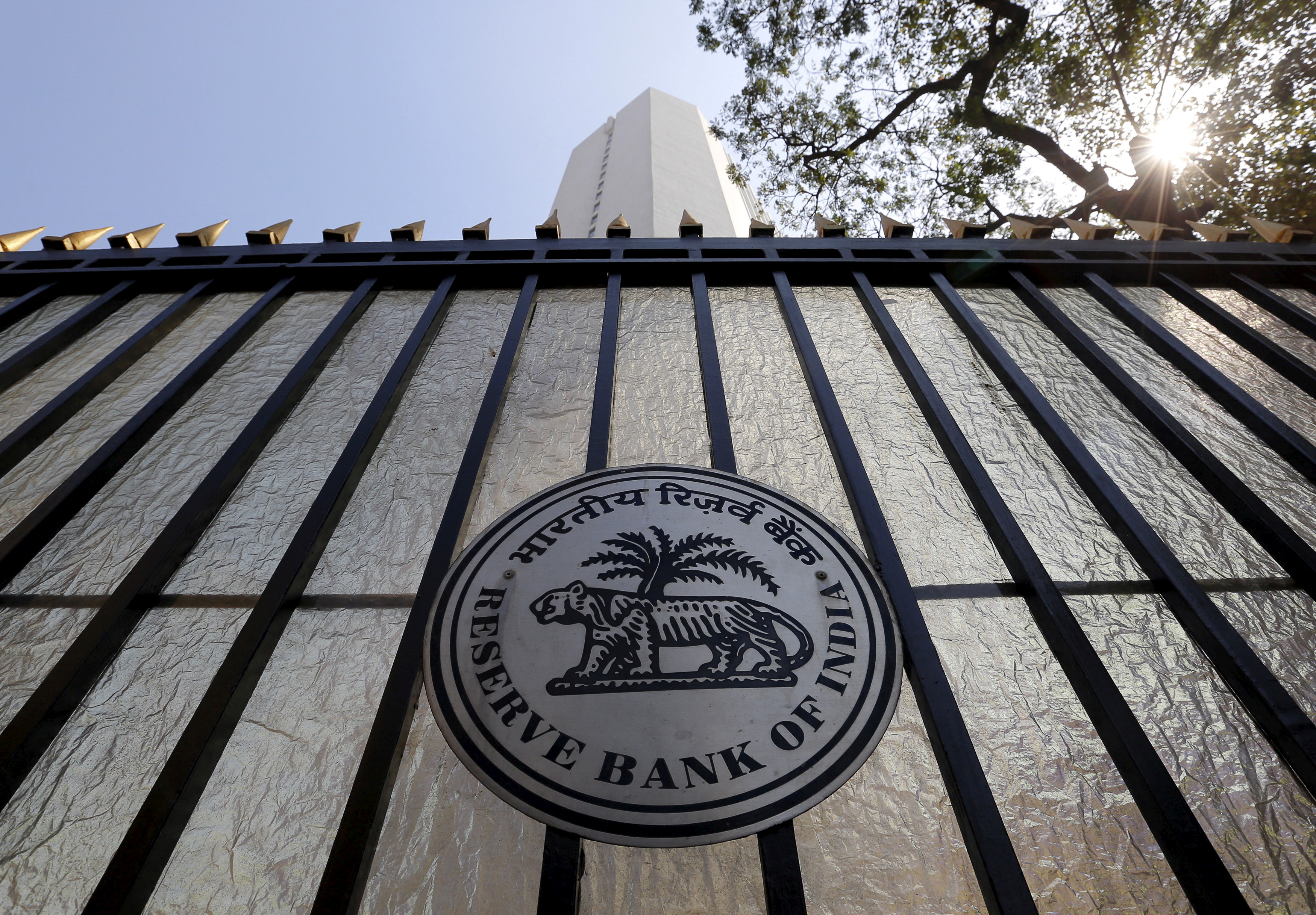 The Reserve Bank of India (RBI) seal is pictured on a gate outside the RBI headquarters in Mumbai