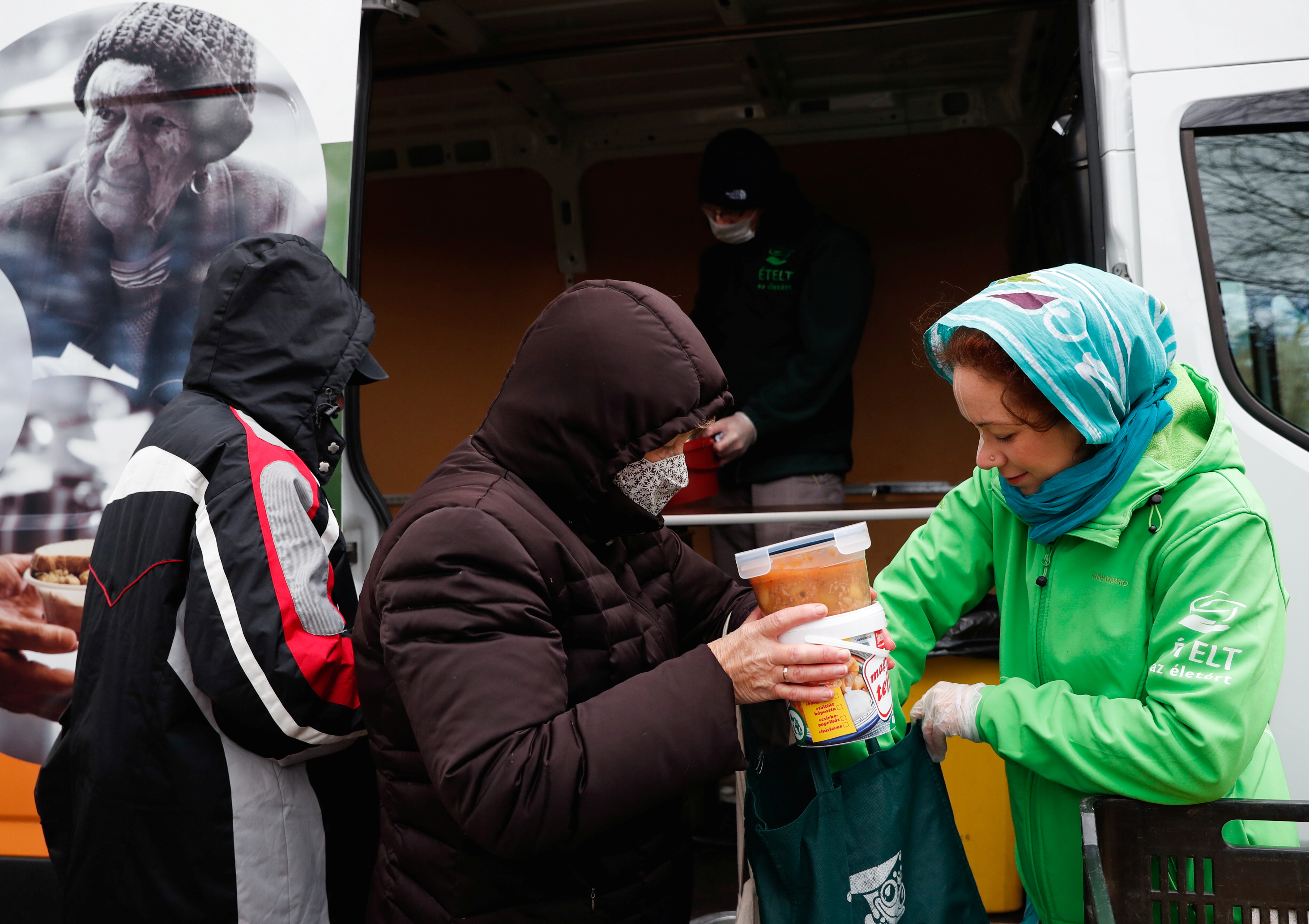 Residents receive free food from Food for Life Foundation in Budapest