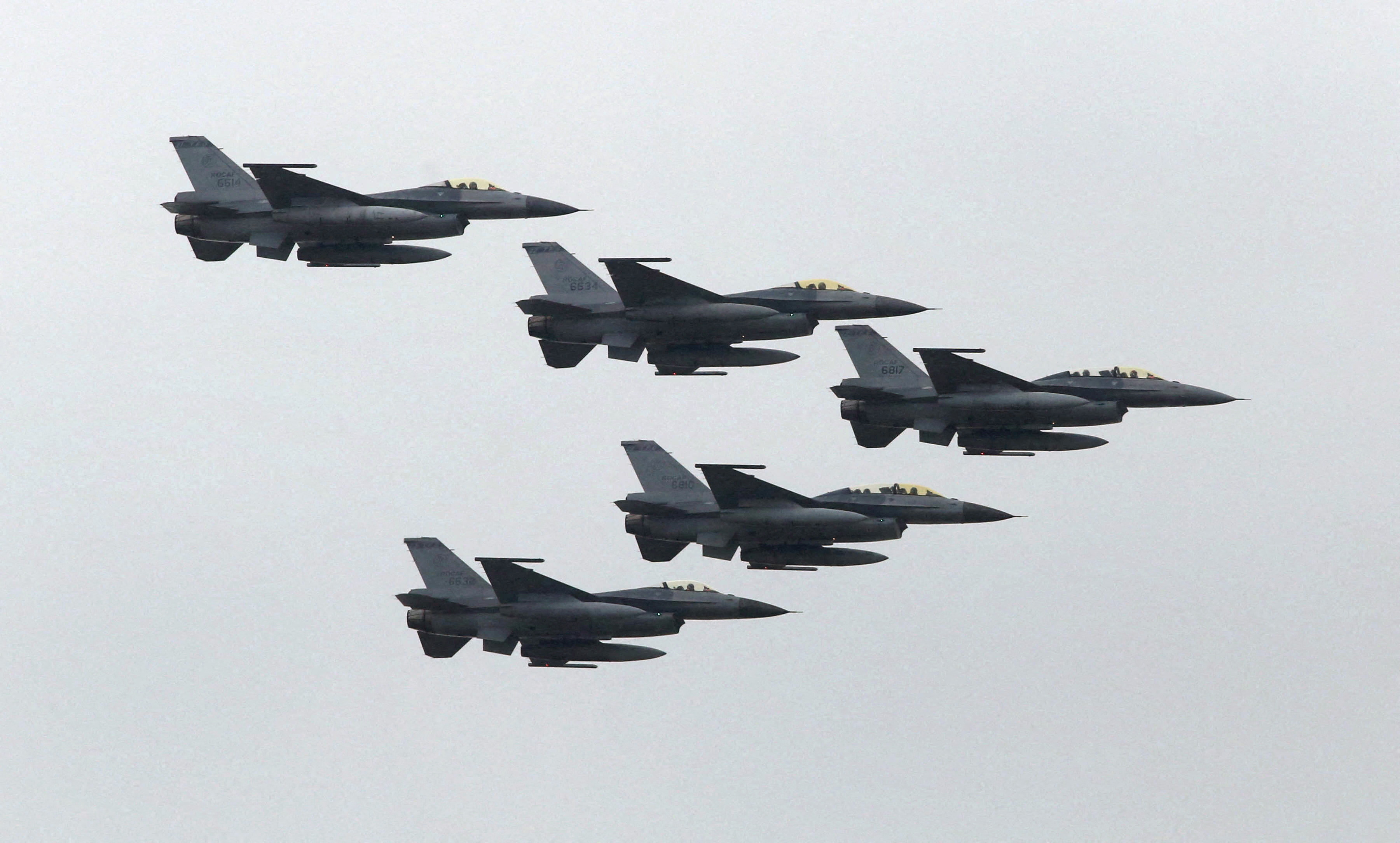 Taiwan Air Force's F-16 fighter jets fly during the annual Han Kuang military exercise at an army base in Hsinchu