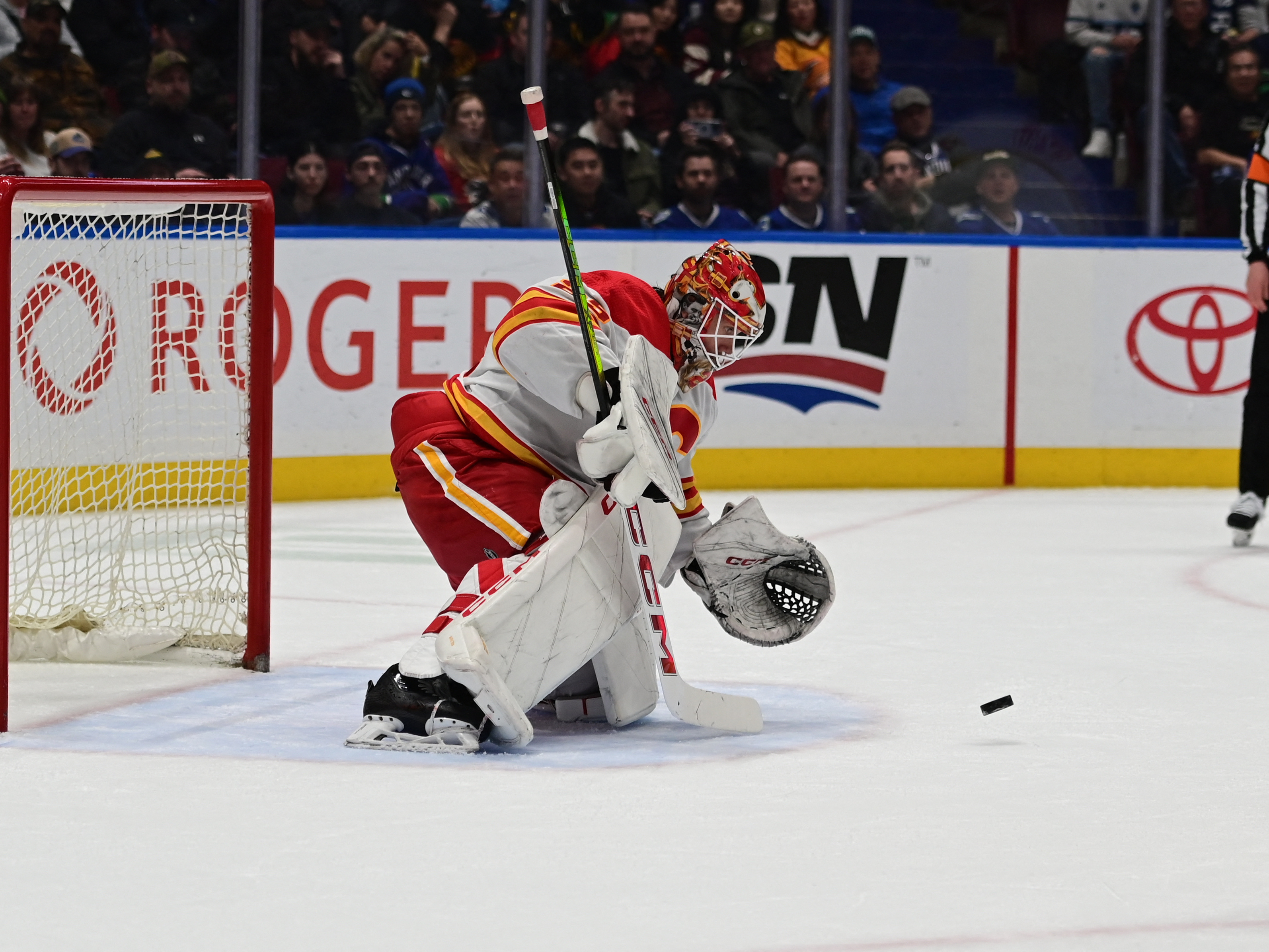 Nils Hoglander Scores Twice As Canucks Top Flames | Reuters