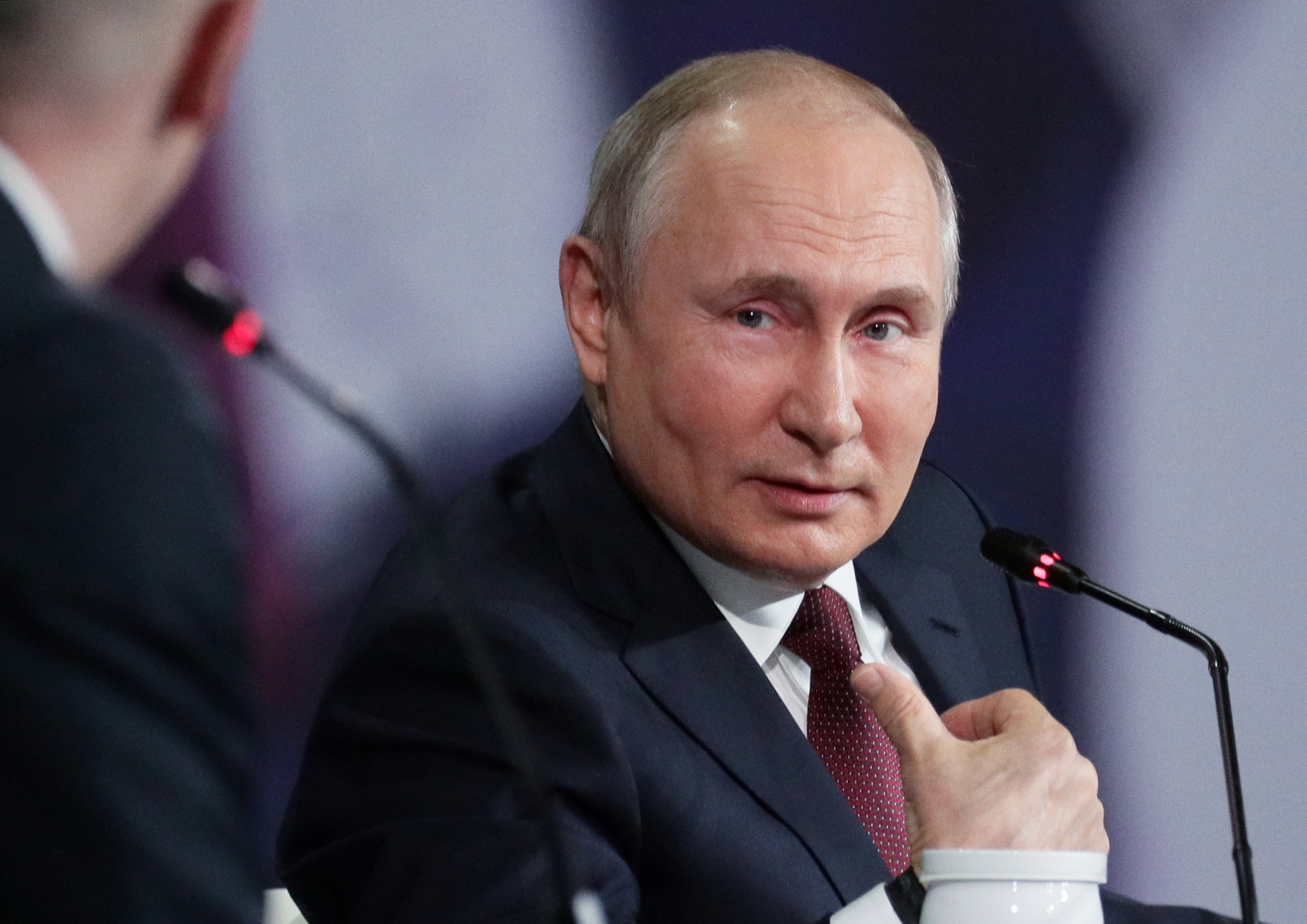 Russian President Putin attends a session of the St. Petersburg International Economic Forum