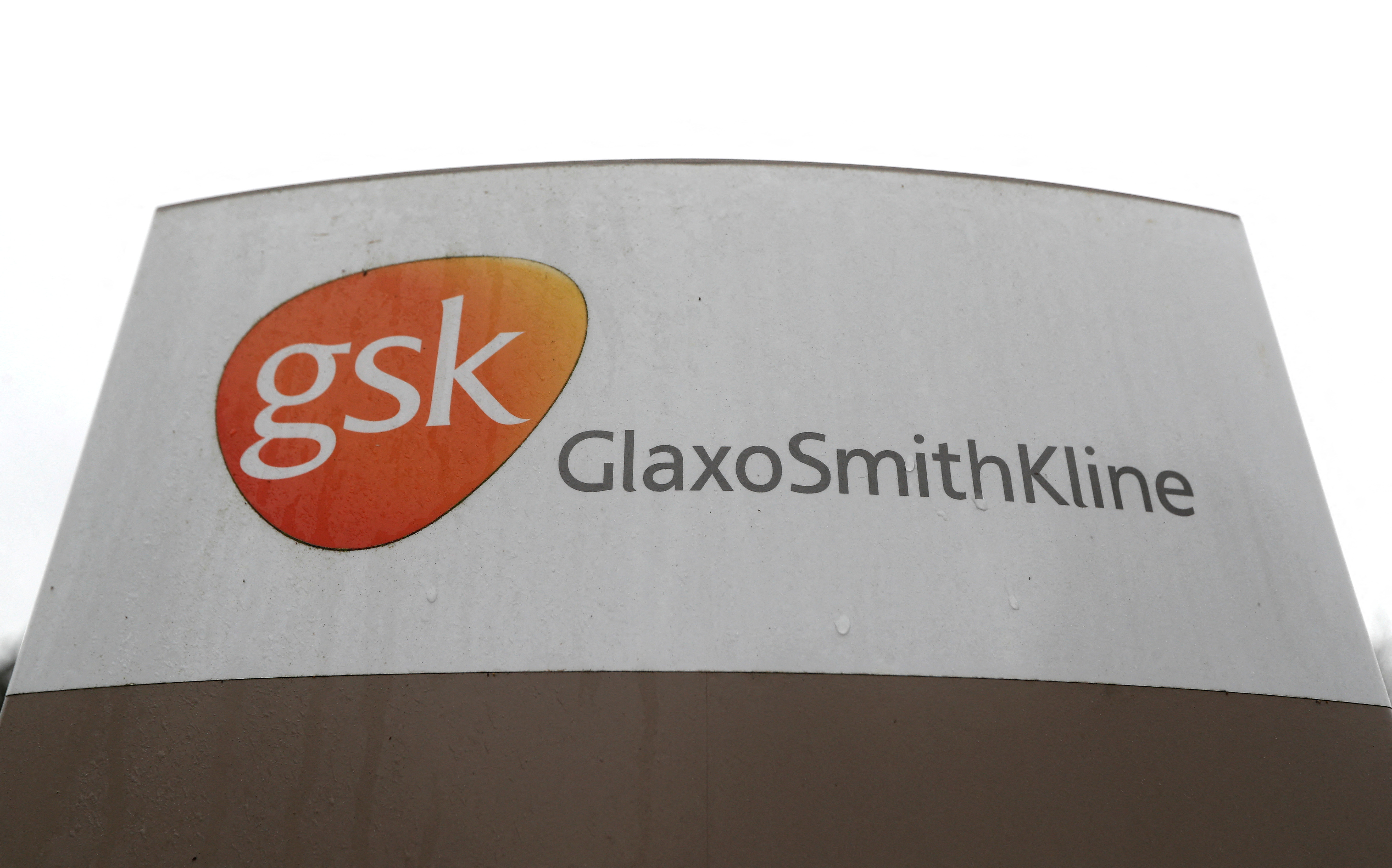 A GlaxoSmithKline (GSK) logo is seen at the GSK research centre in Stevenage, Britain November 26, 2019. REUTERS/Peter Nicholls