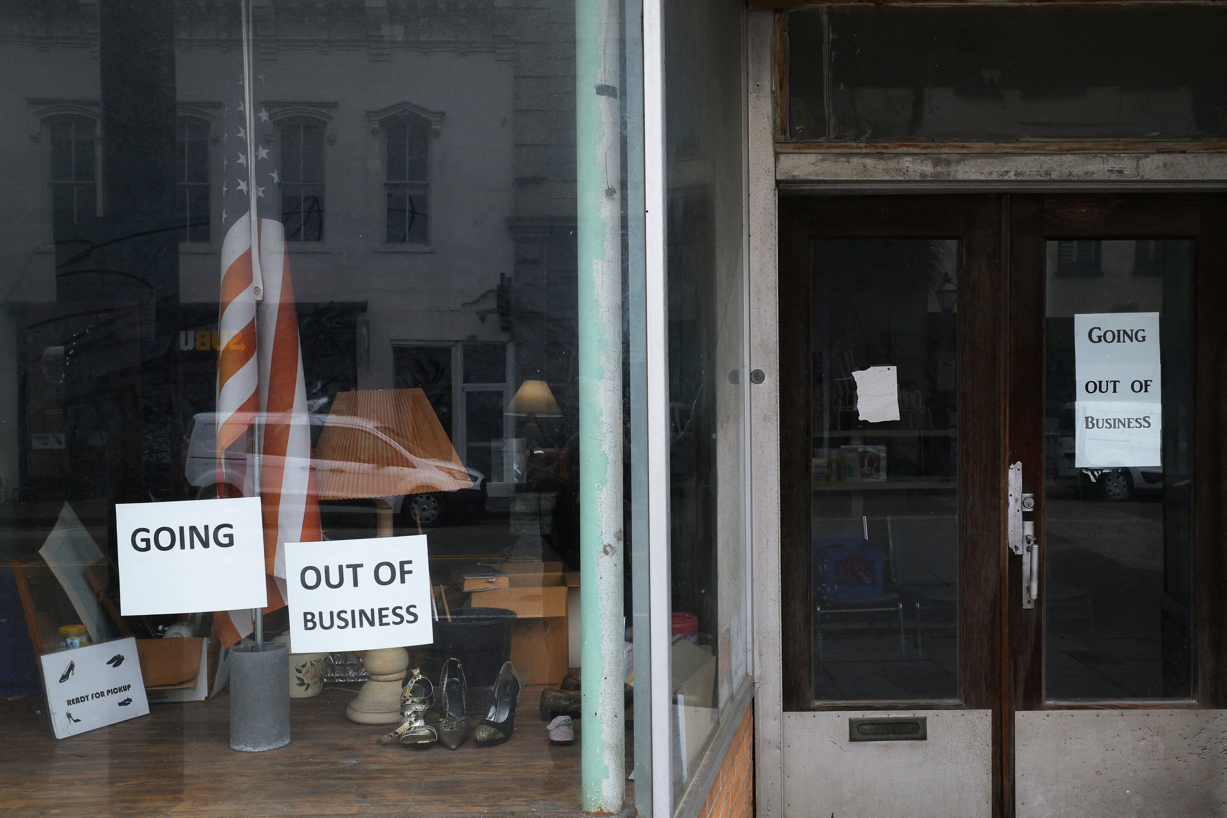 The sign in a storefront window read "Going Out of Business" in Charleston