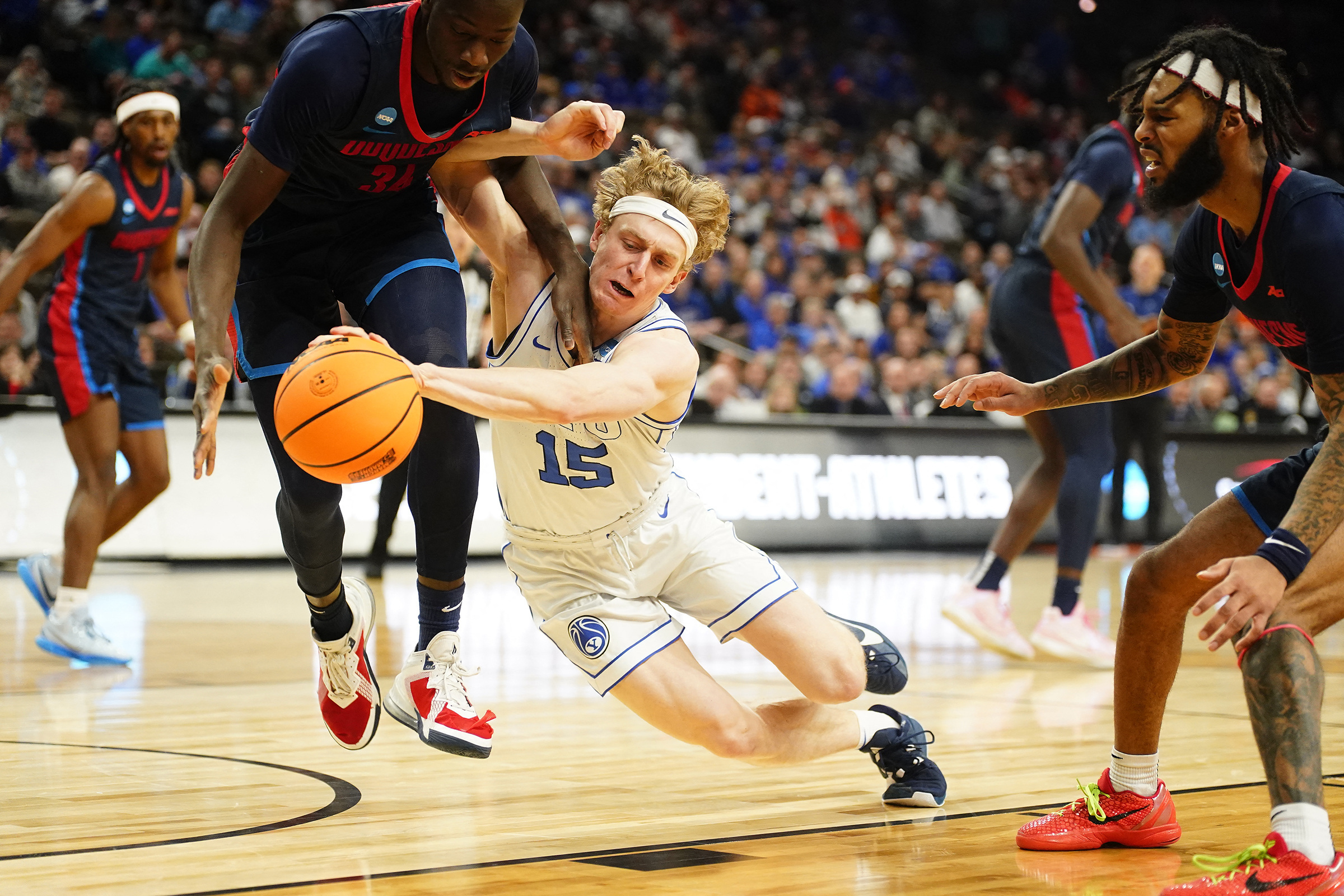 Duquesne upsets BYU for first NCAA tourney win in 55 years Reuters