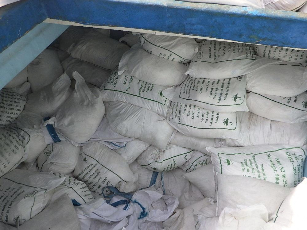 A large quantity of urea fertiliser and ammonium perchlorate sit in a cargo compartment on board of a fishing vessel intercepted by U.S. naval forces while transiting international waters in the Gulf of Oman