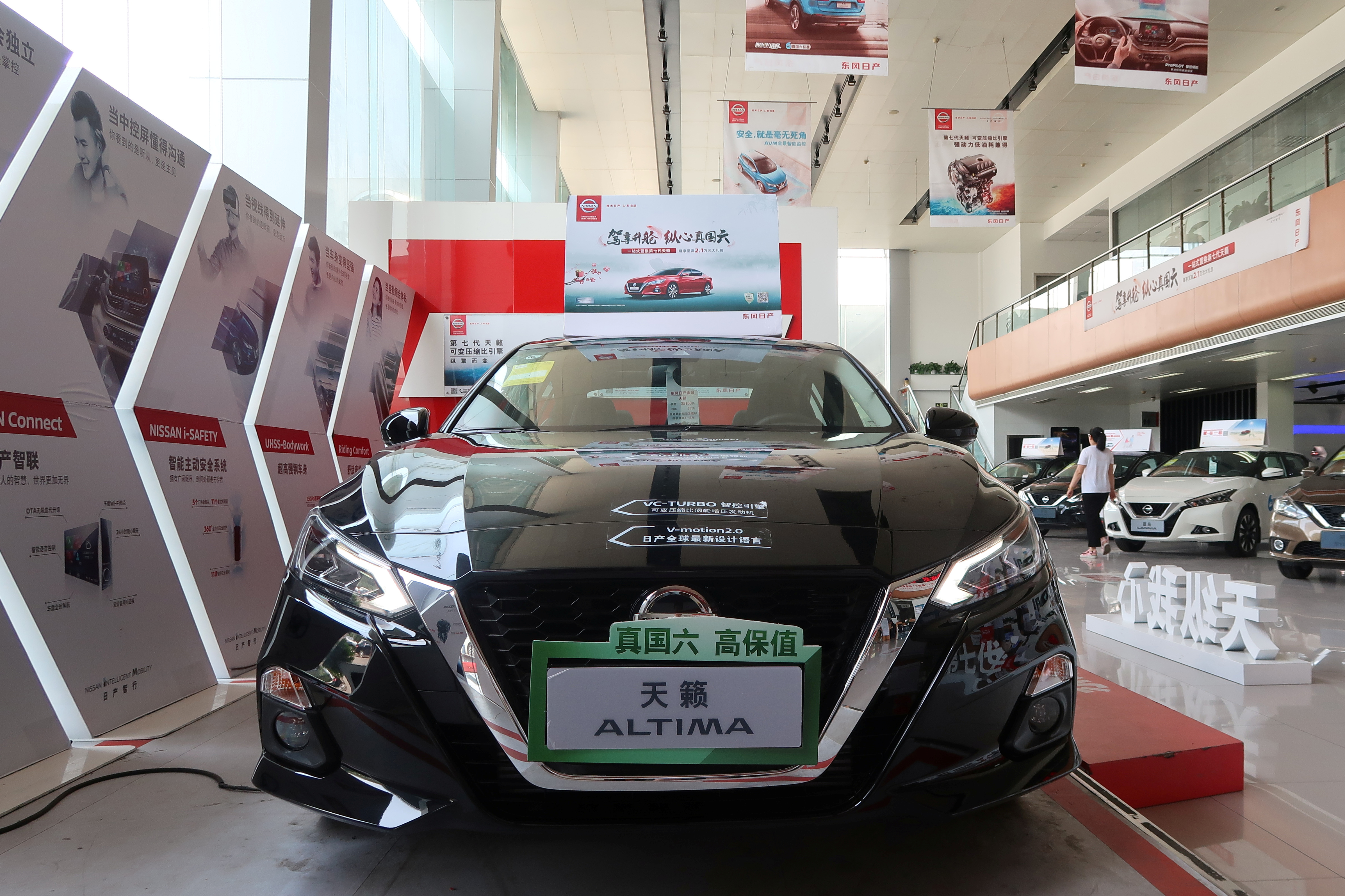 A Nissan Altima car with a China Stage VI emission standard is seen at a dealership in Beijing