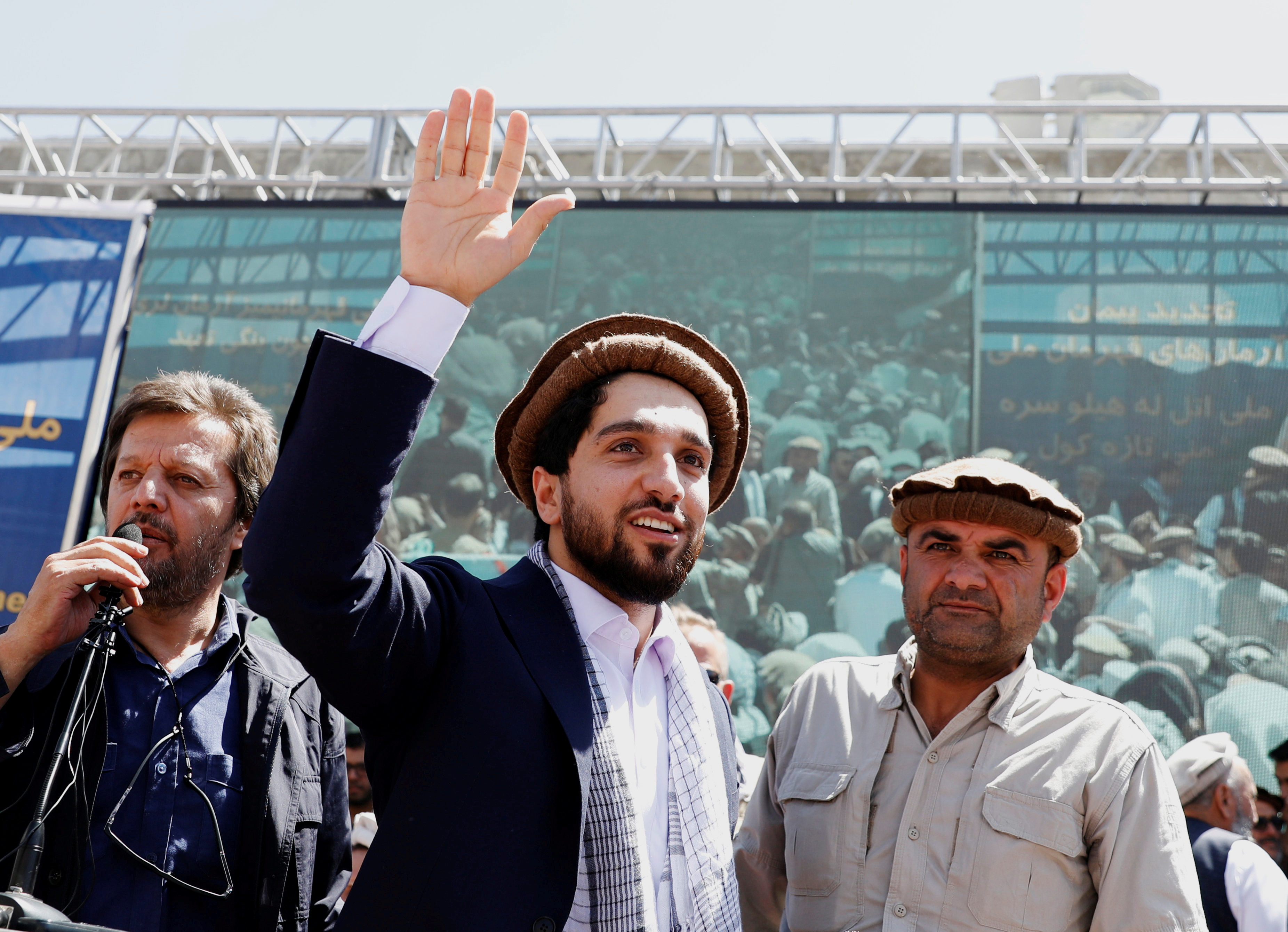 Ahmad Massoud, son of the slain hero of the anti-Soviet resistance Ahmad Shah Massoud, waves as he arrives to attend a new political movement in Bazarak