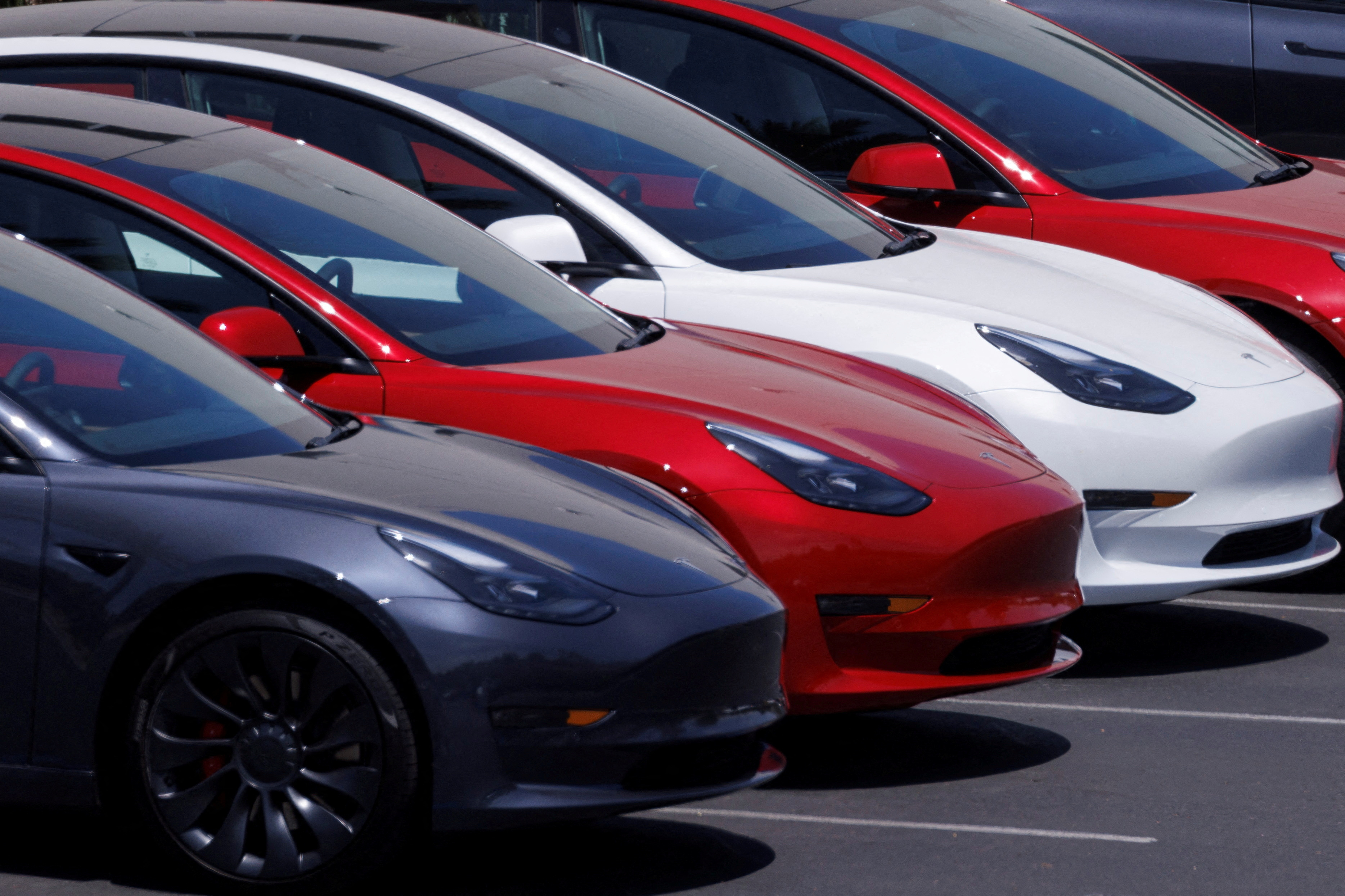Tesla vehicles are displayed at a sales and service center in Vista, California