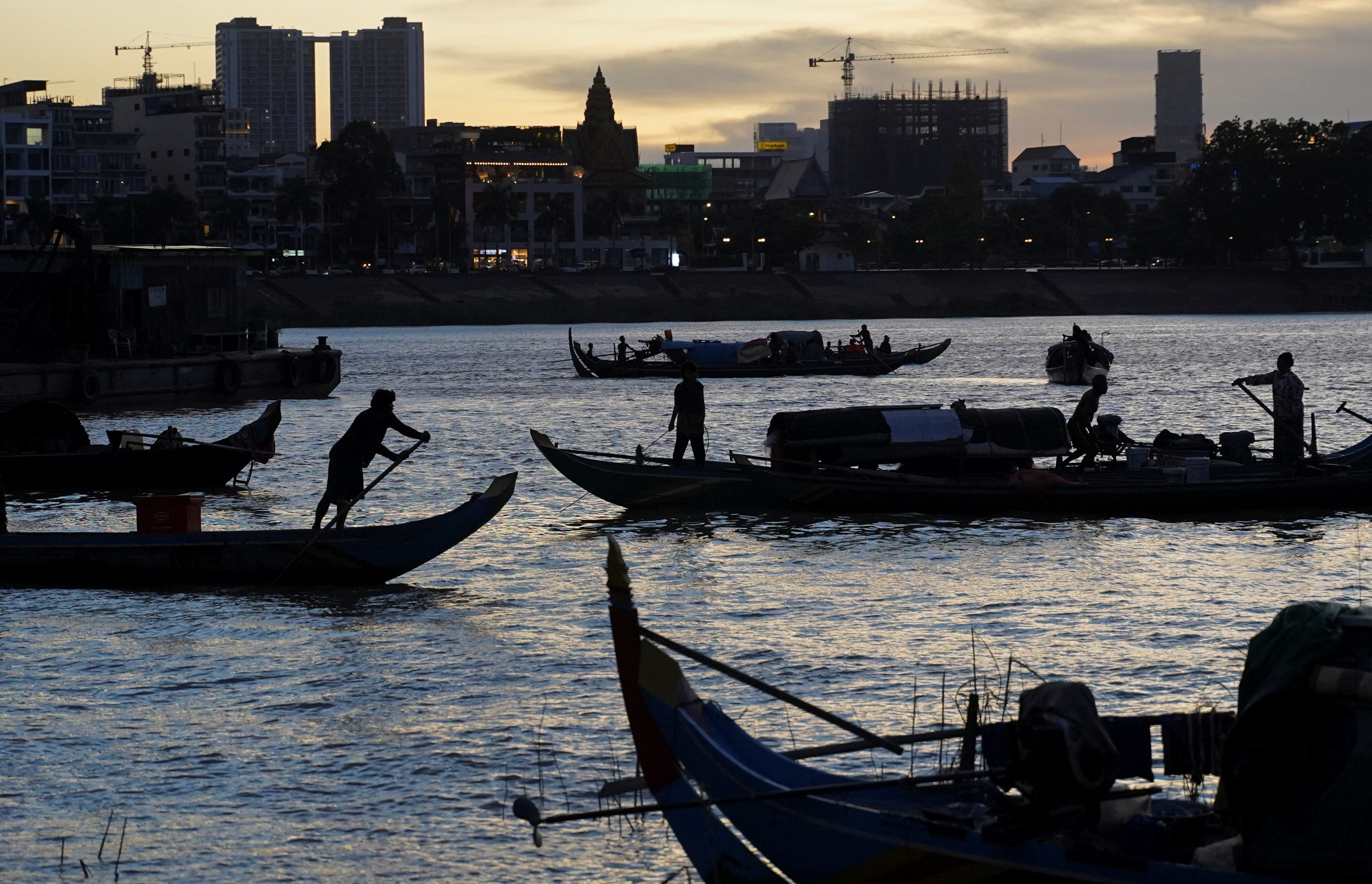 Fishing boats are seen on the Tonle Sap River in Phnom Penh