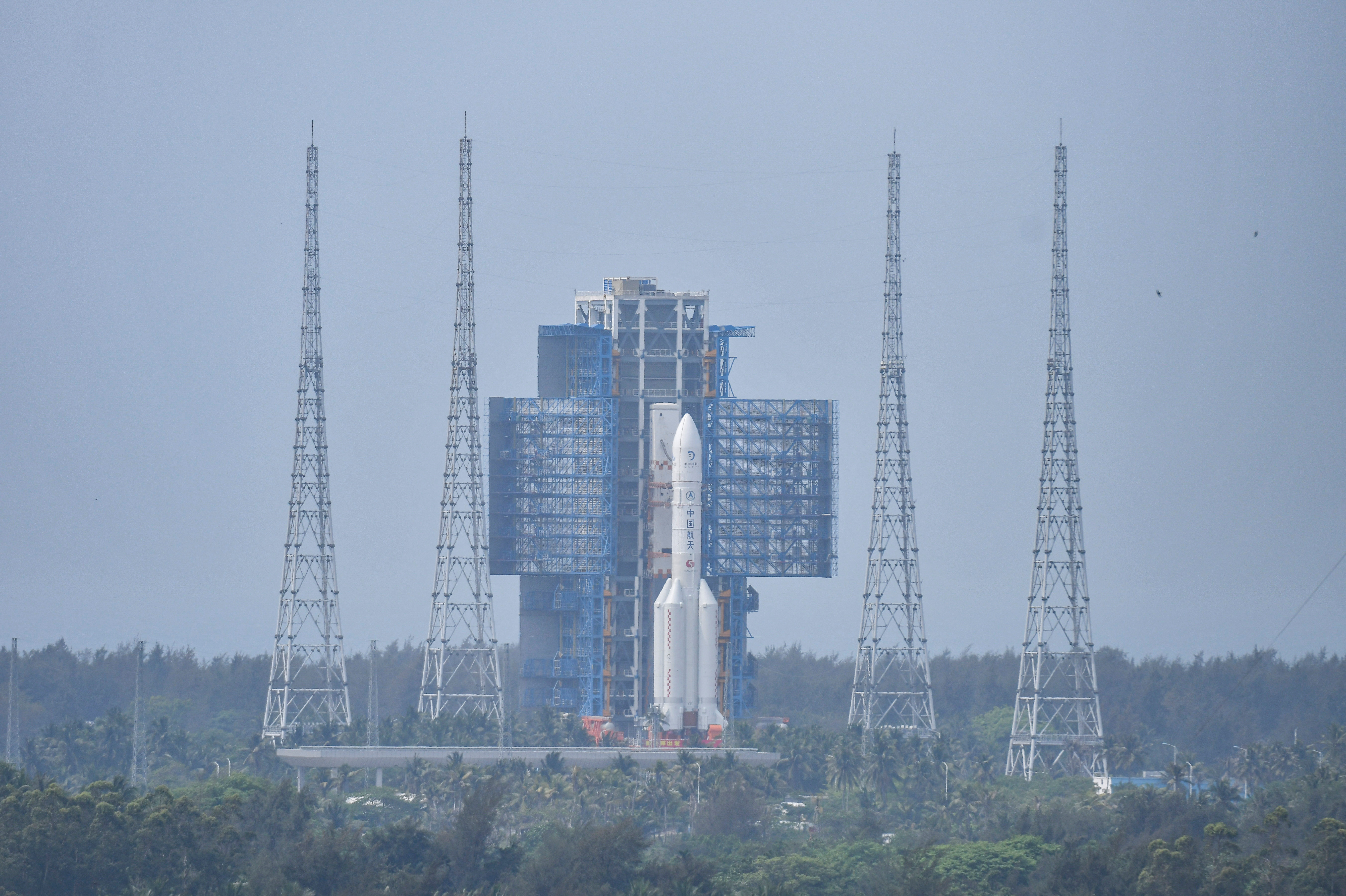 The Chang'e 6 lunar probe and the Long March-5 Y8 carrier rocket combination sit atop the launch pad at the Wenchang Space Launch Site in Hainan
