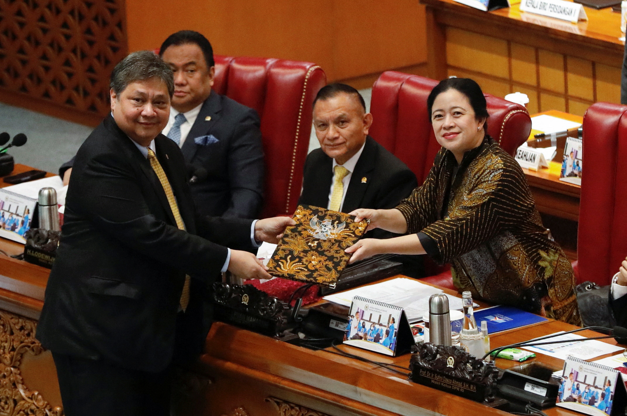 Indonesian Coordinating Minister for Economic Affairs, Airlangga Hartarto attends a photo session with House Speaker Puan Maharani during the parliamentary plenary meeting in Jakarta