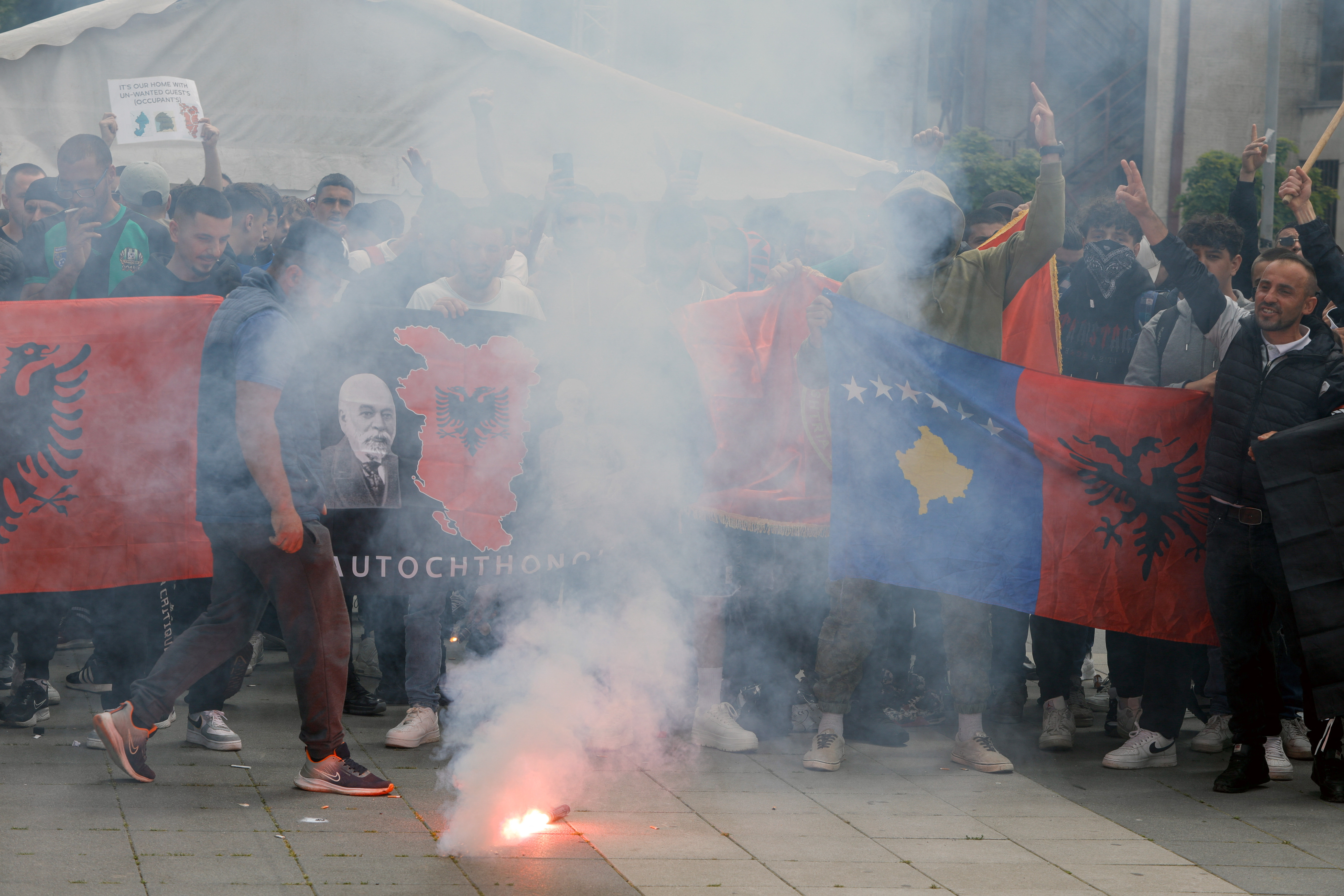 Albanians protest near the bridge which connects south and north Mitrovica