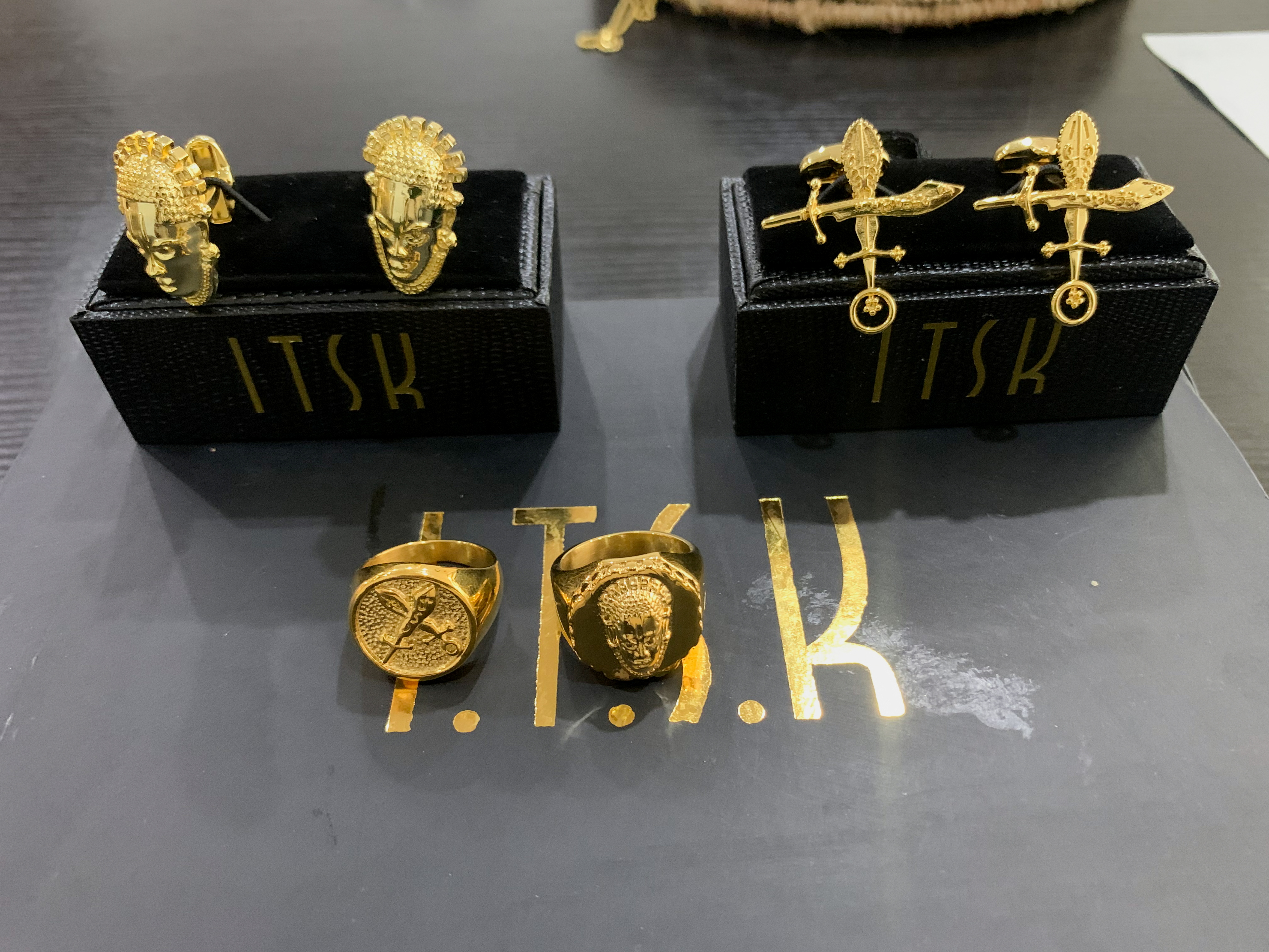 Gold-finished Nigerian fashion accessories inspired from cultural symbols are seen on display at the ITSK Gold office, in Lagos
