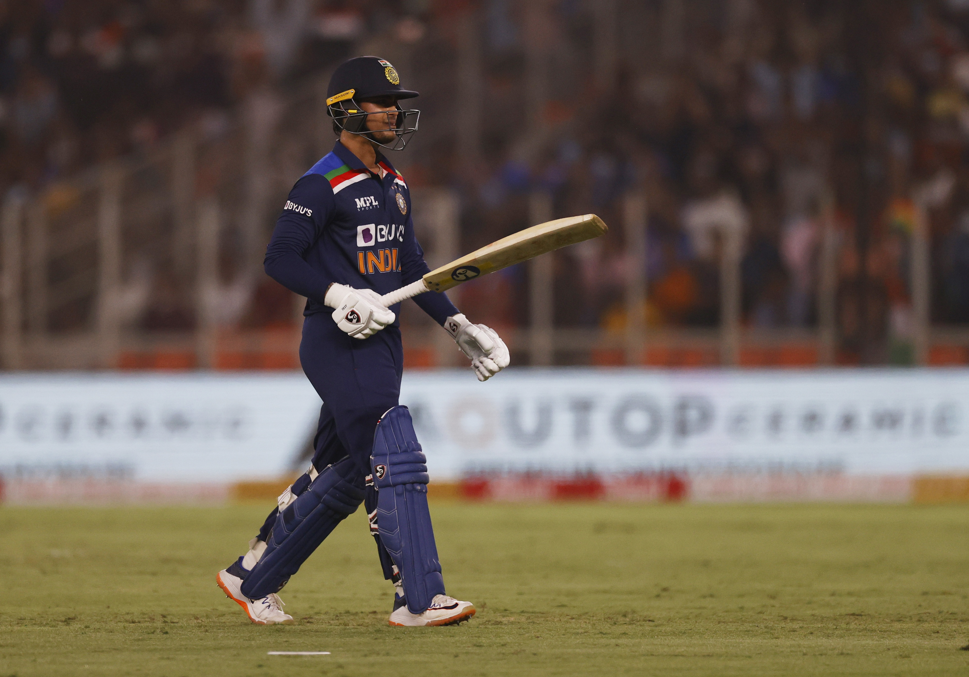 Cricket - Second Twenty20 International - India v England - Narendra Modi Stadium, Ahmedabad, India - March 14, 2021 India's Ishan Kishan walks after losing his wicket REUTERS/Danish Siddiqui