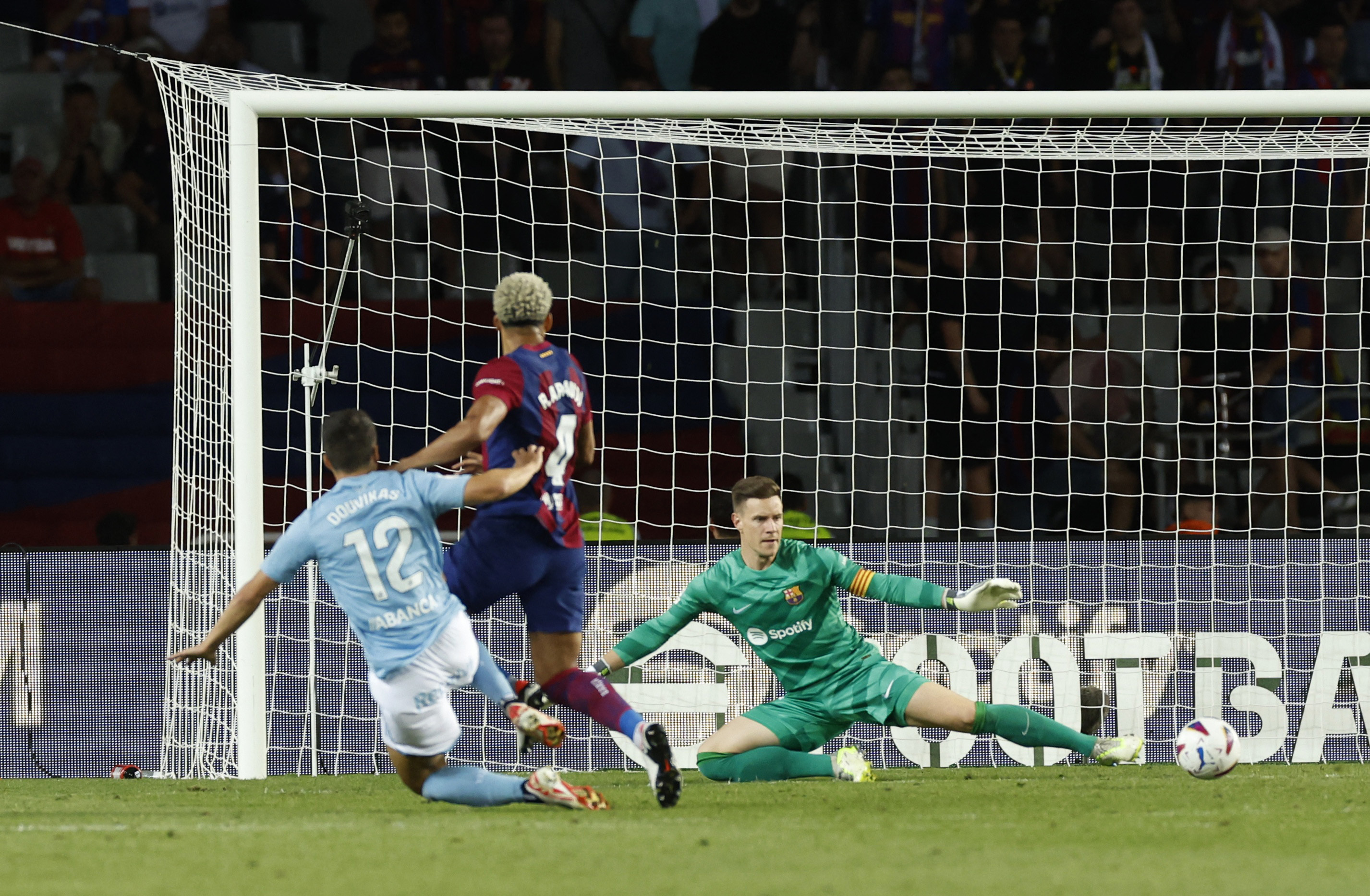 Lewandowski, Cancelo lead Barcelona to 3-2 comeback win over Celta with 3  goals in final 10 minutes