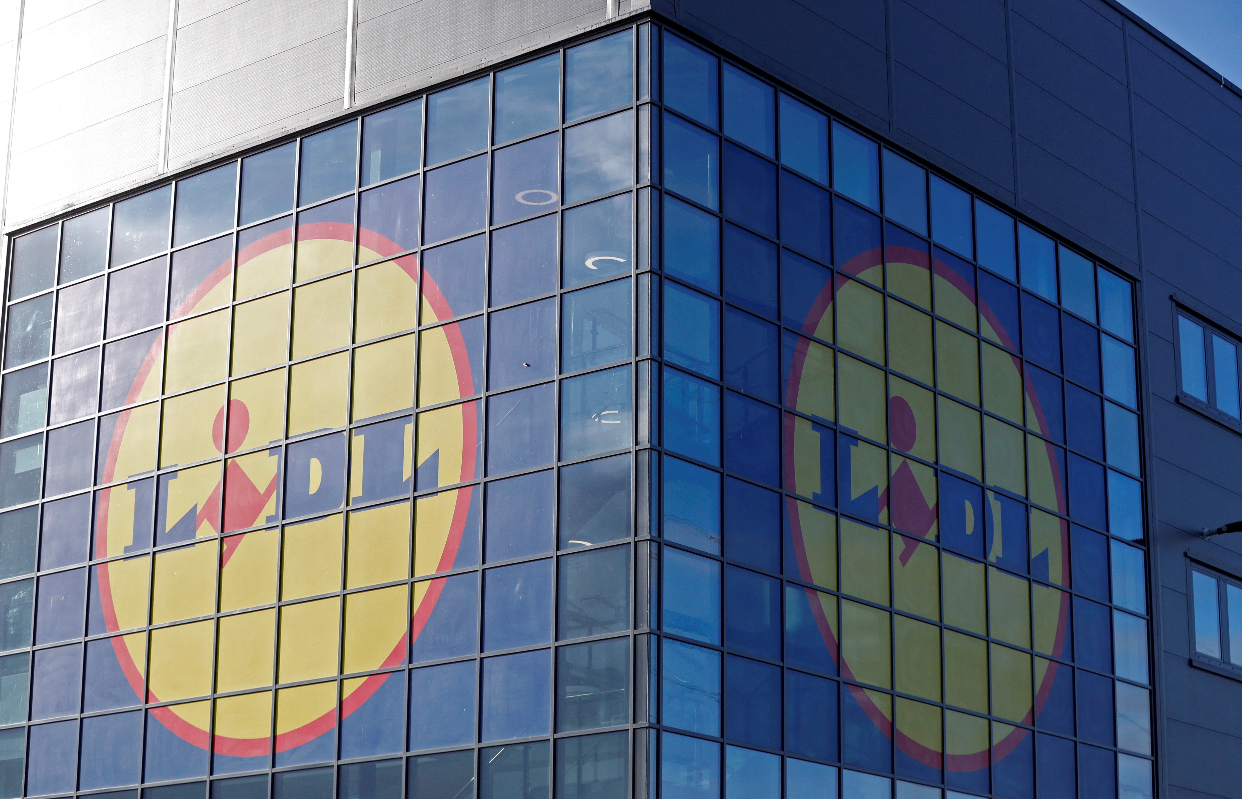 Lidl's logos are seen on the exterior of its distribution centre in Motherwell, Scotland