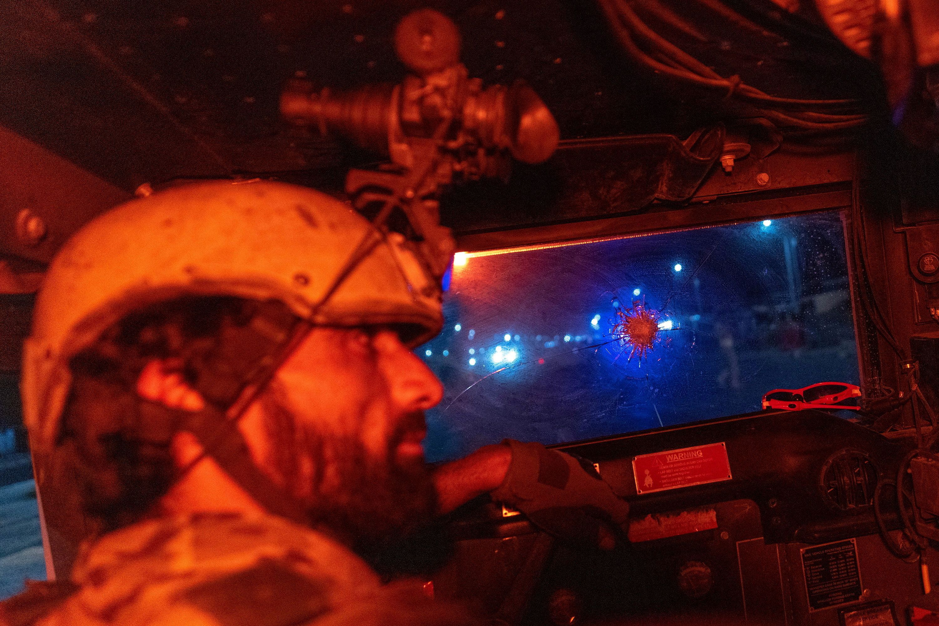 A member of the Afghan Special Forces drives a humvee during a combat mission against Taliban, in Kandahar province