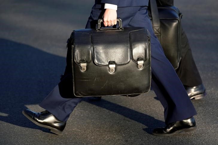 A military aide carries a briefcase containing codes for the nuclear arsenal