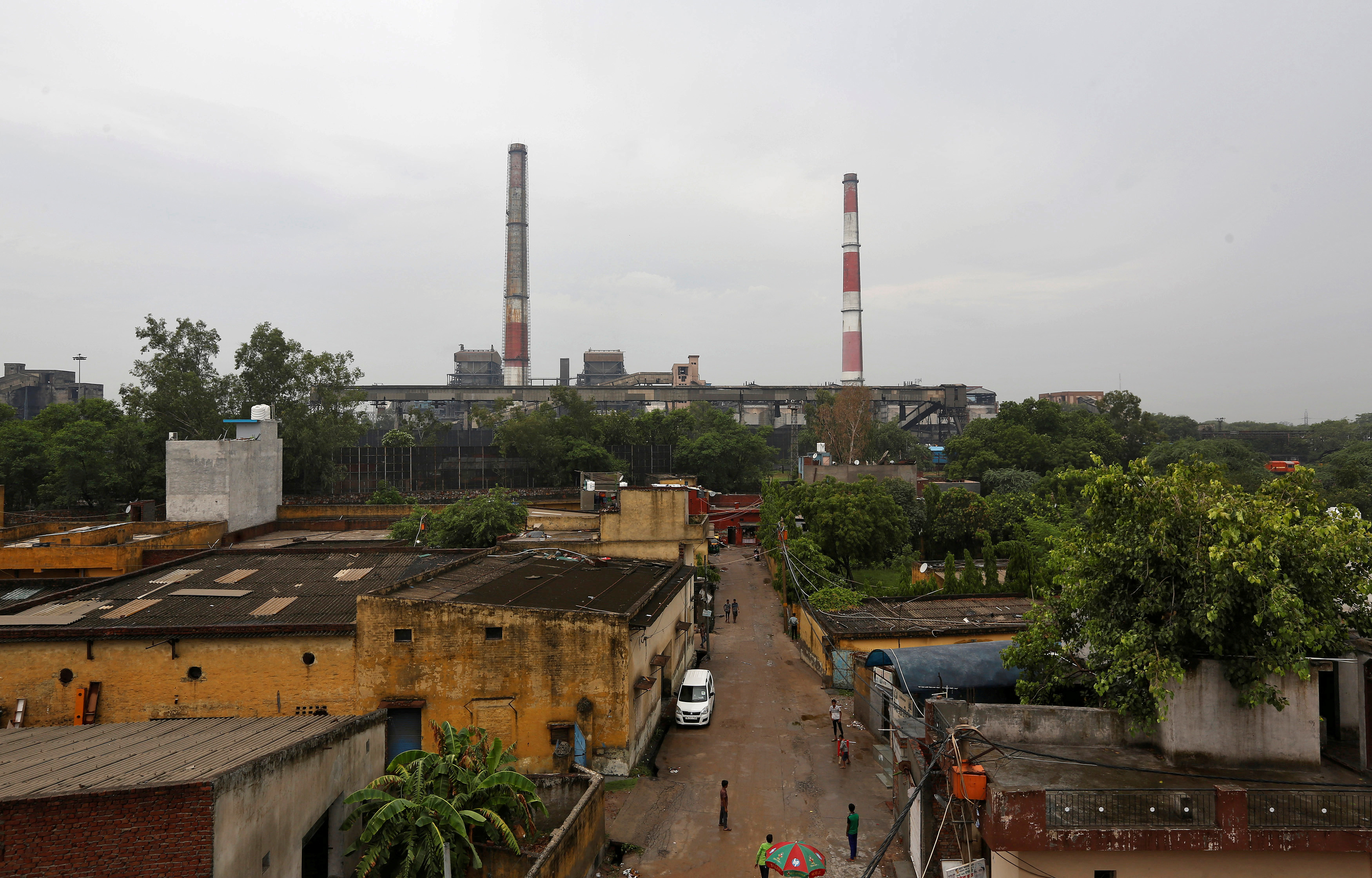 Chimneys of a coal-fired power plant are pictured in New Delhi