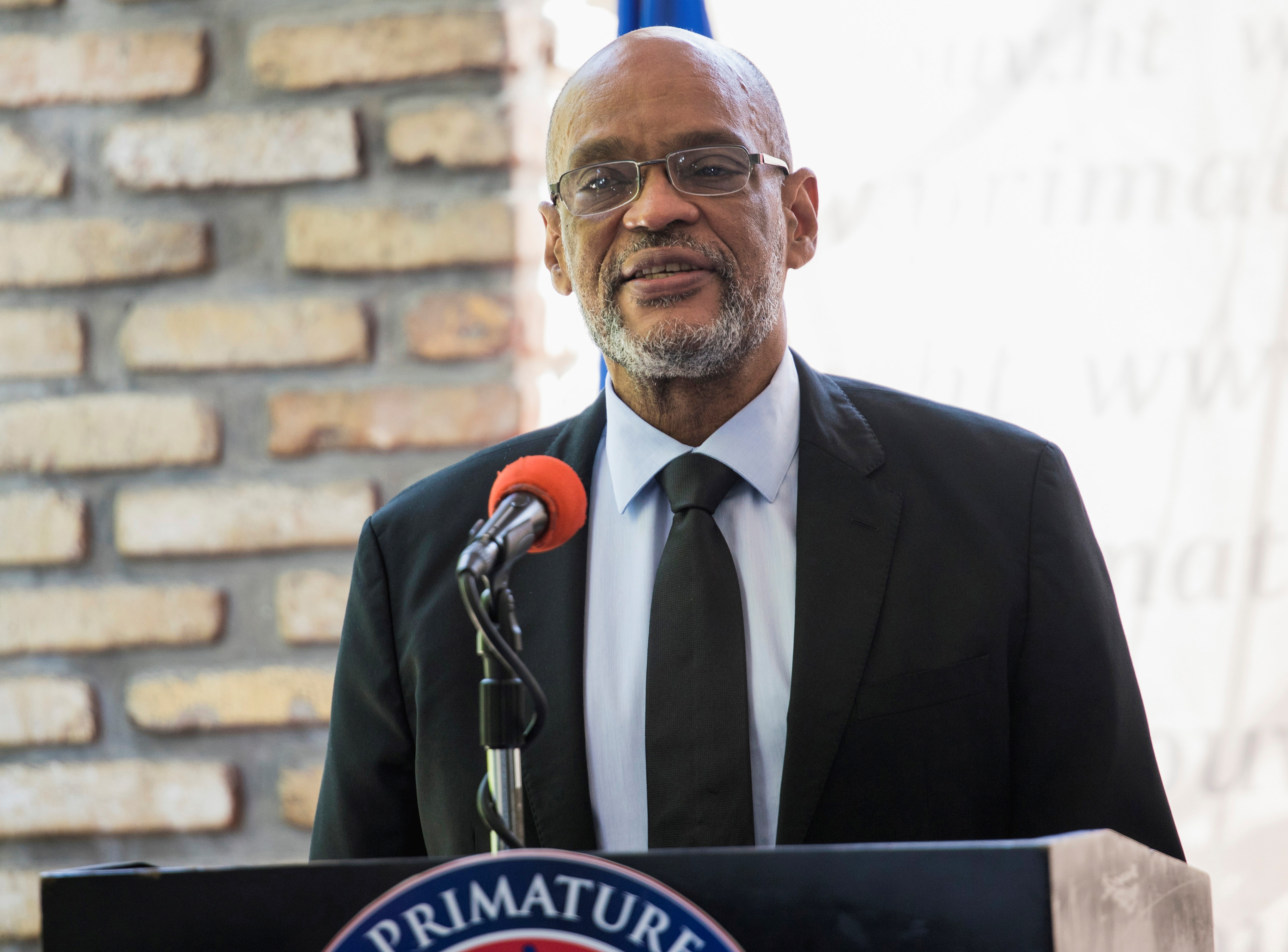 Haiti's Prime Minister Ariel Henry attends the signing ceremony of the 