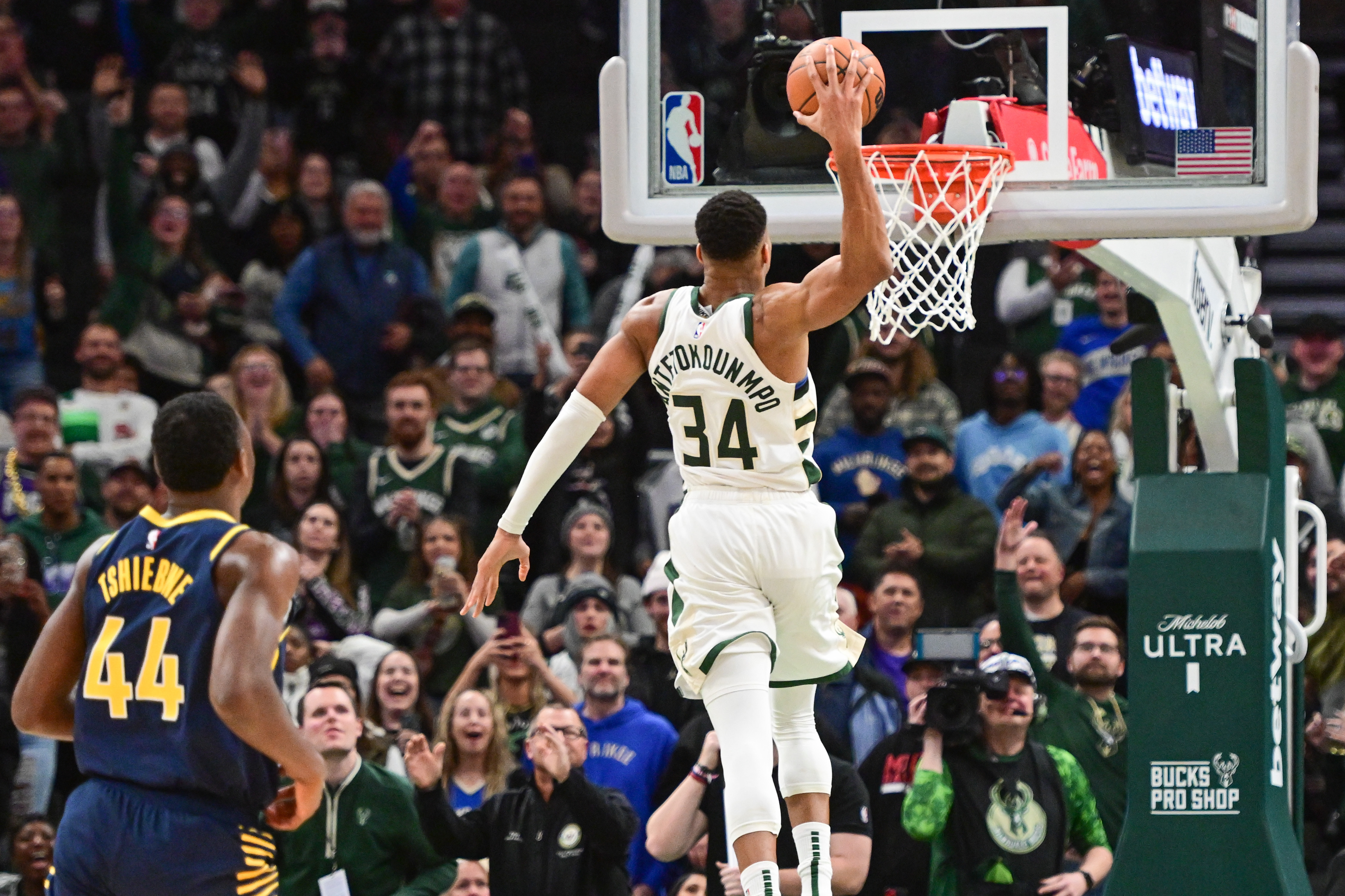 giannis antetokounmpo dunks from outside the three point line