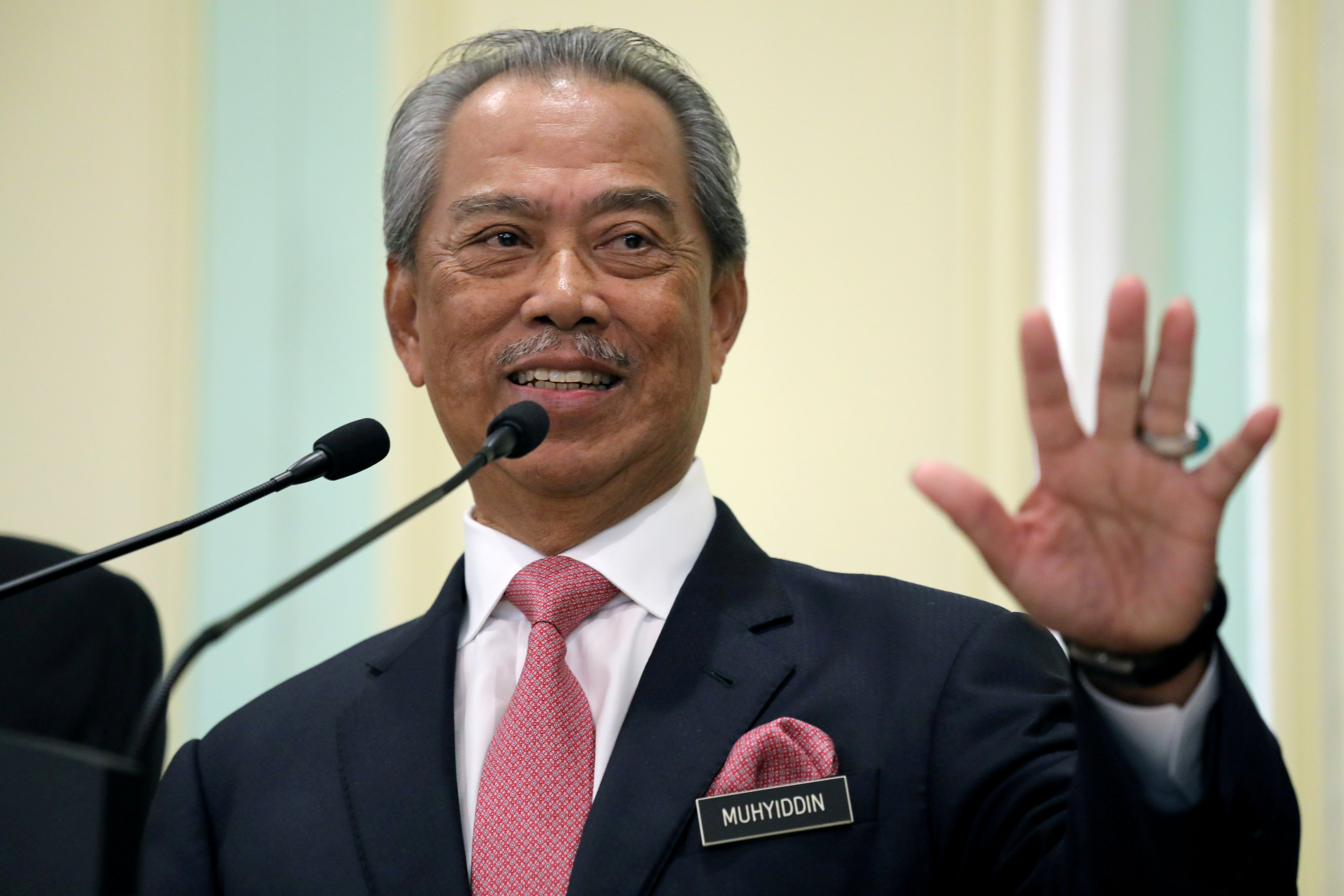 Malaysia's Prime Minister Muhyiddin Yassin speaks during a news conference in Putrajaya