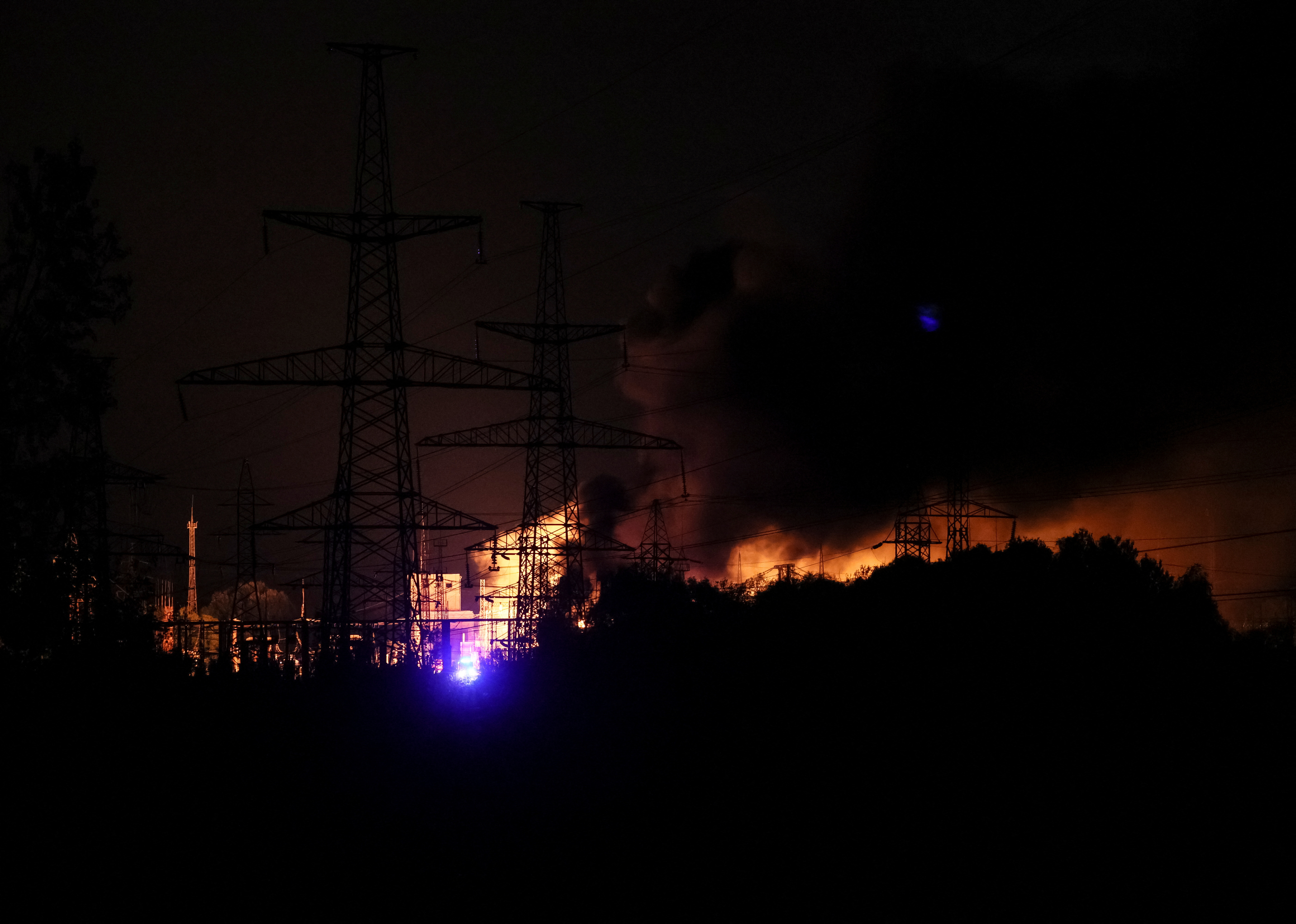 View shows a burning thermal power plant hit by a Russian missile strike in Kharkiv