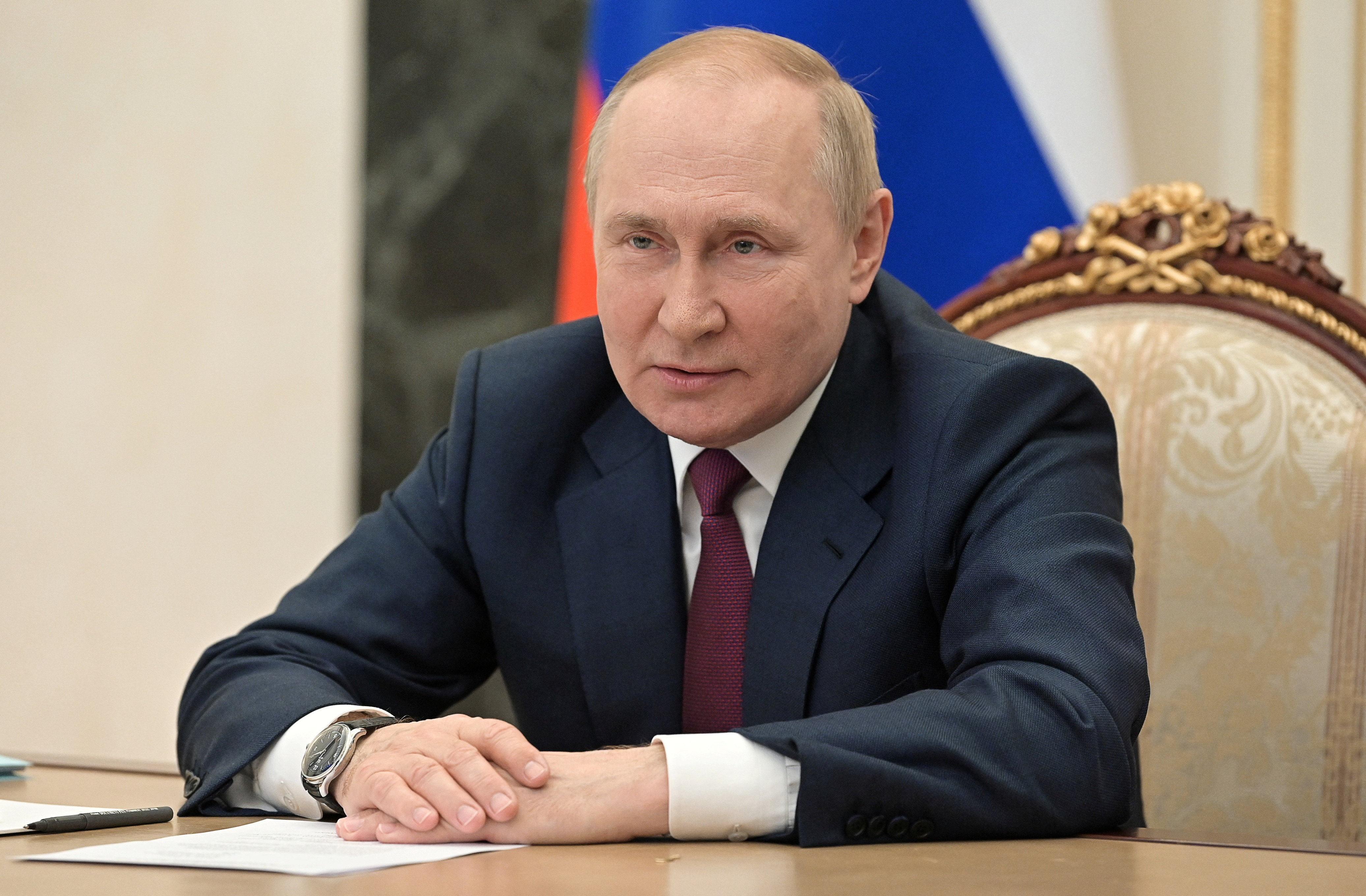 Russian President Vladimir Putin attends a meeting with participants of the Bolshaya Peremena national contest for school students, via video link in Moscow
