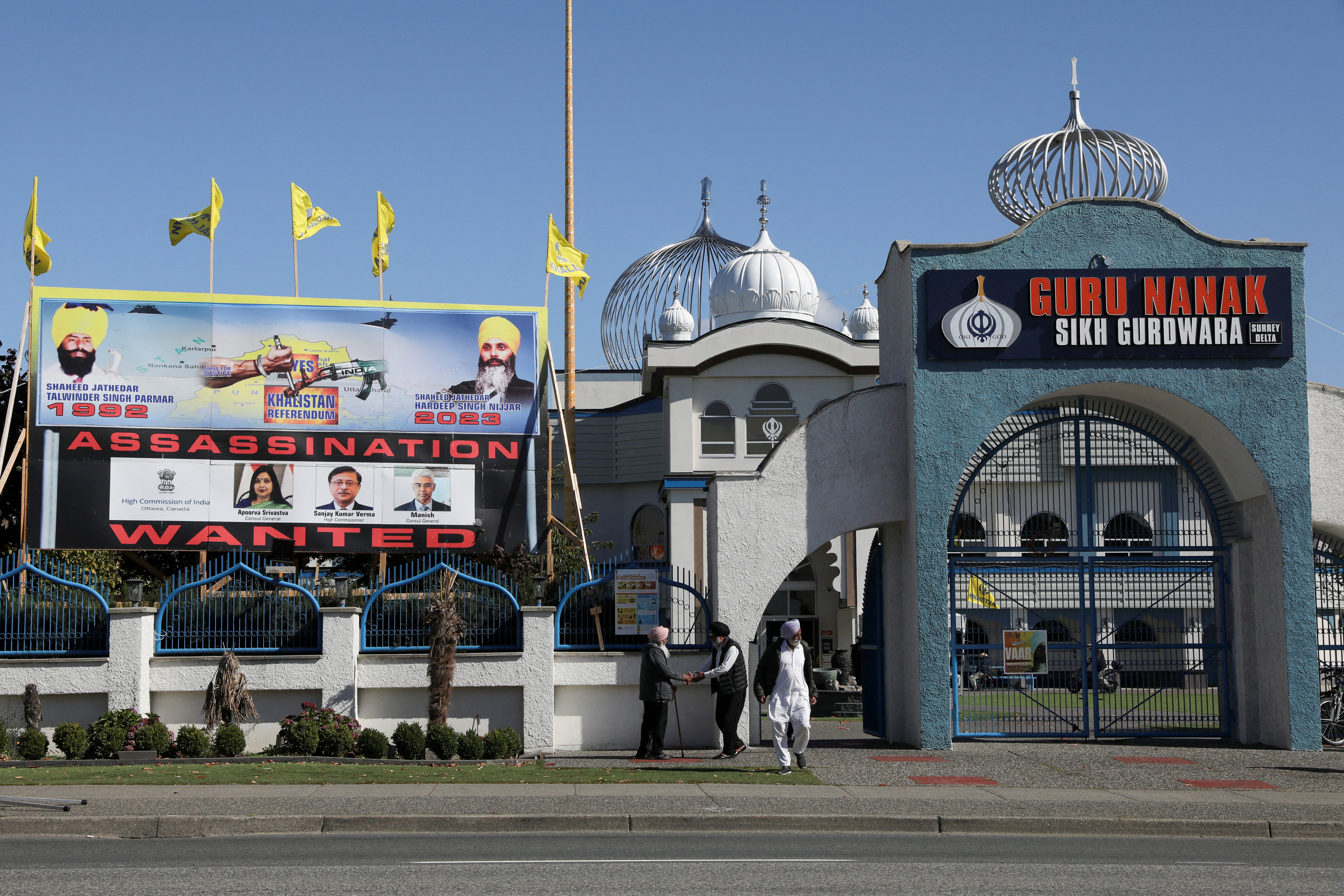 A sign outside the Guru Nanak Sikh Gurdwara temple is seen after the killing on its grounds in June 2023 of Sikh leader Hardeep Singh Nijjar, in Surrey