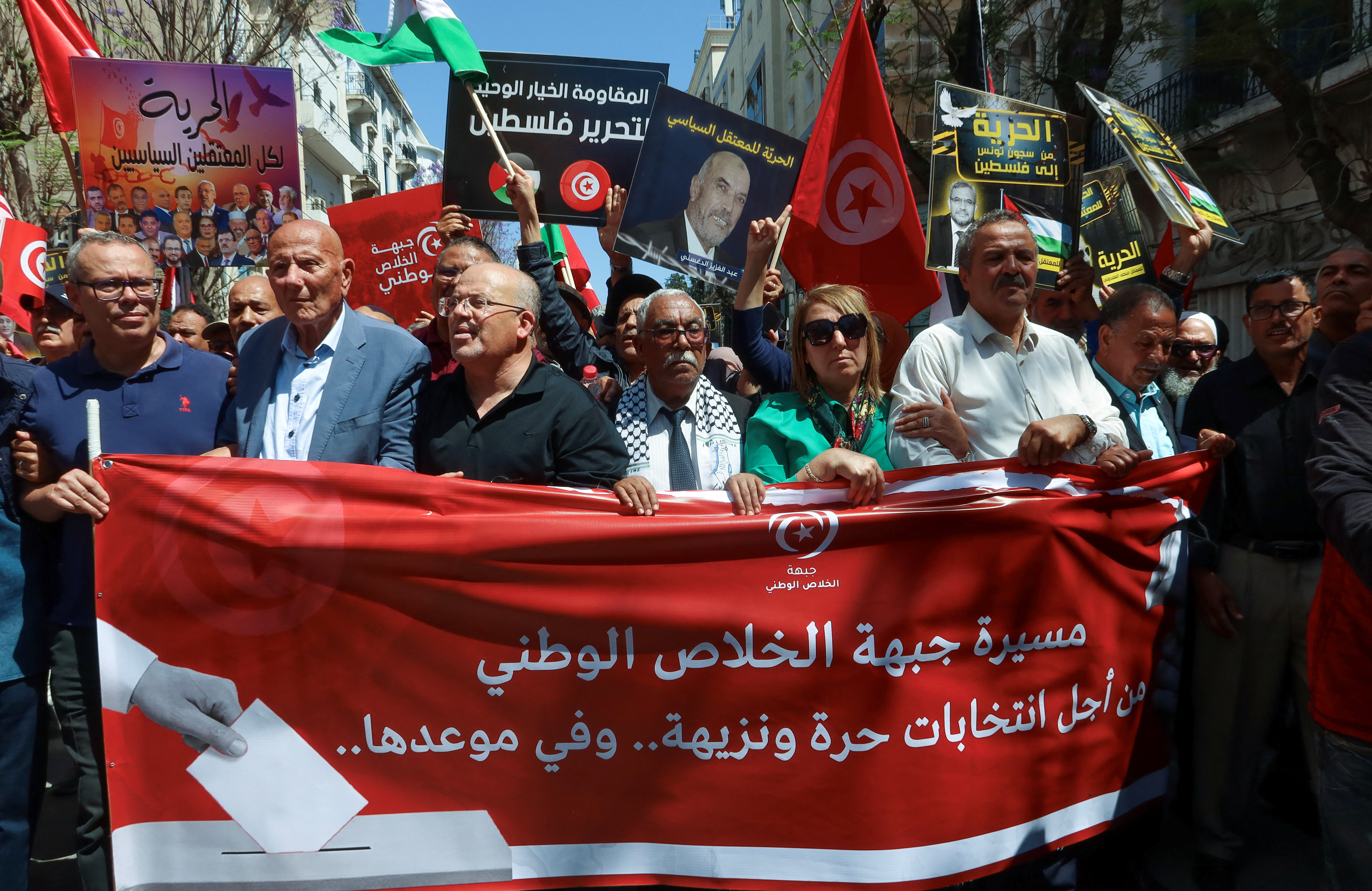 Protest demanding the release of imprisoned journalists, activists, opposition figures and setting a date for fair presidential elections in Tunis