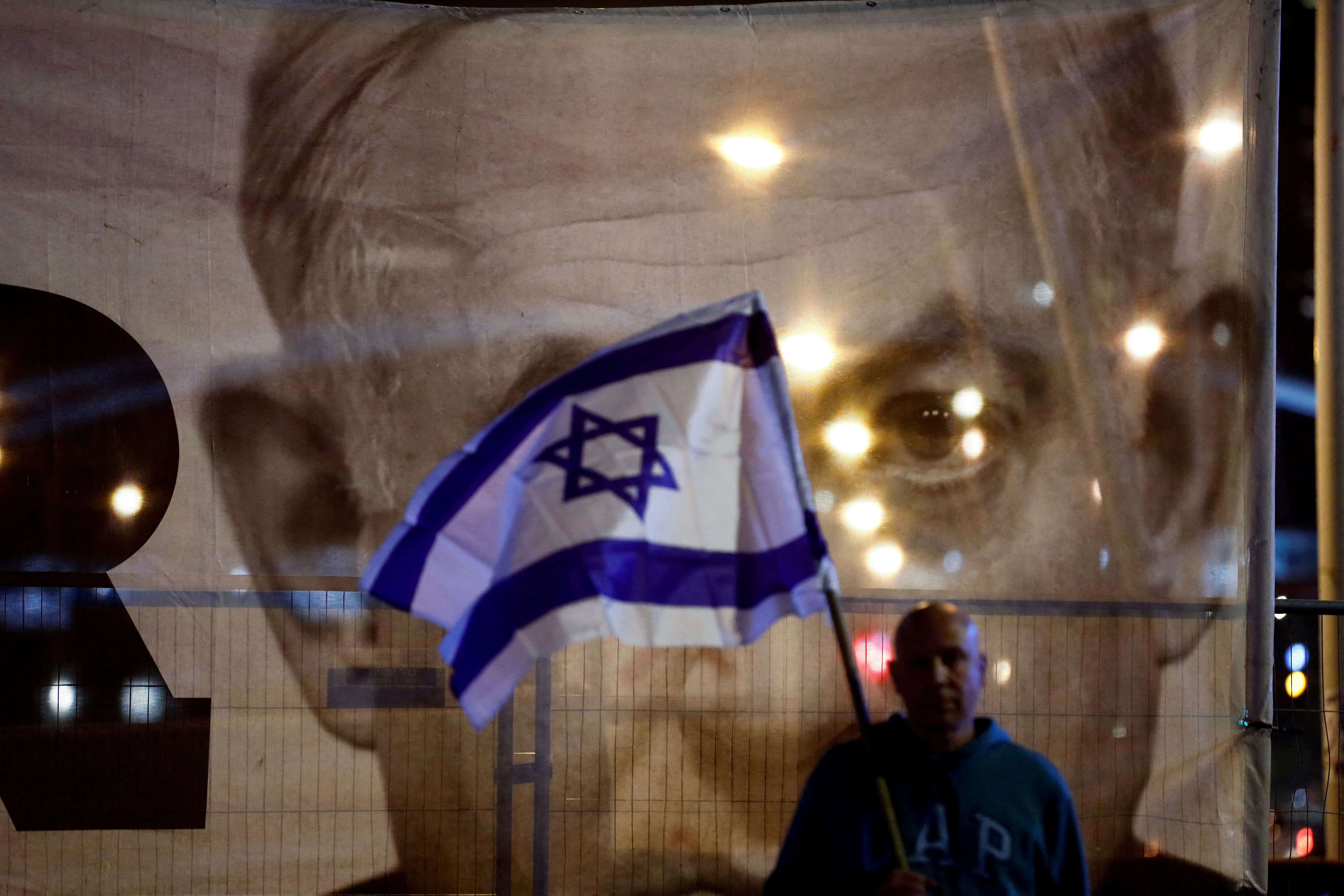Israelis protest Prime Minister Benjamin Netanyahu's new right-wing coalition and its proposed judicial reforms, in Tel Aviv