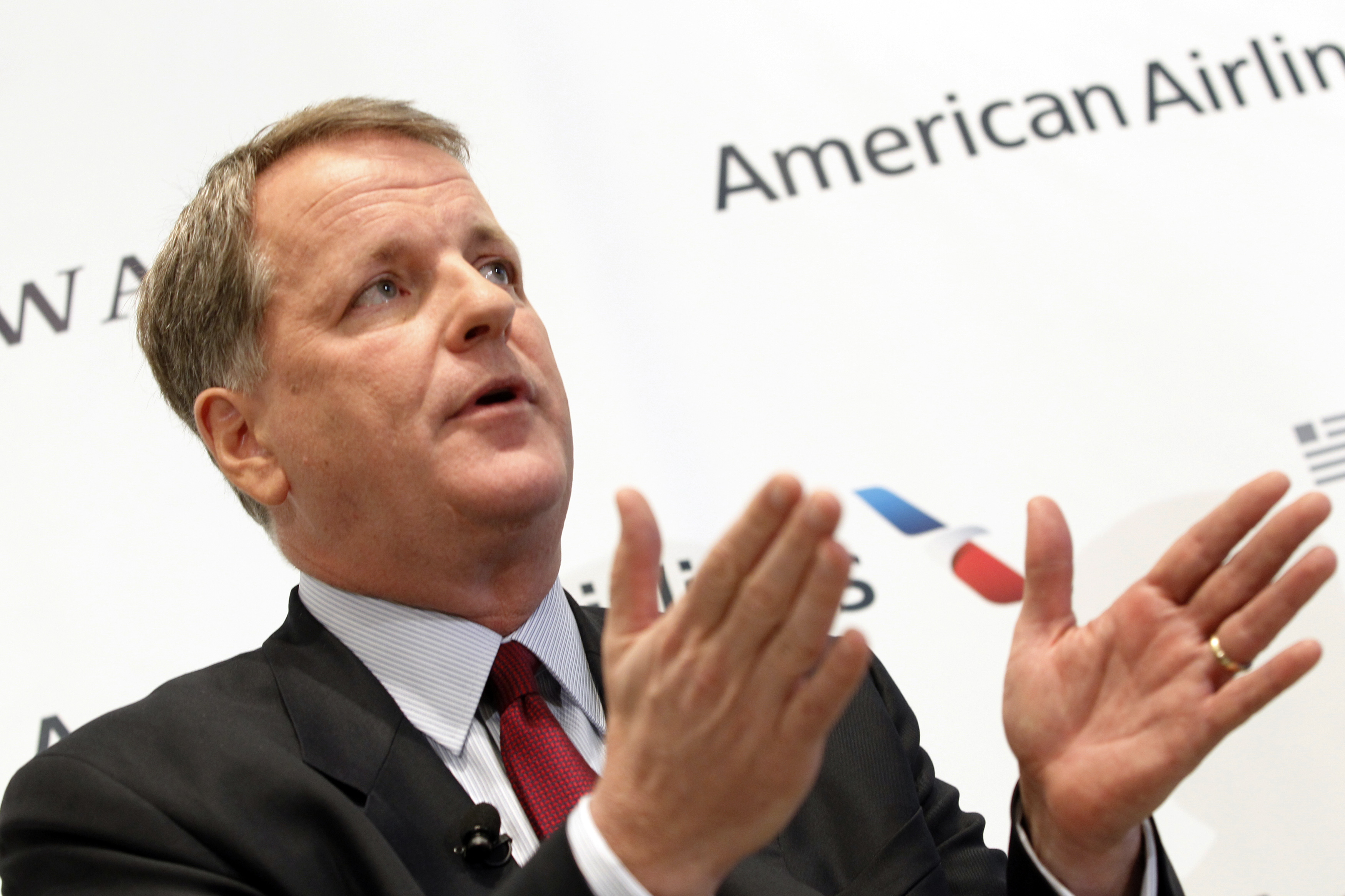 U.S. Airways CEO Doug Parker announces the planned merger of AMR Corp, the parent of American Airlines in Dallas