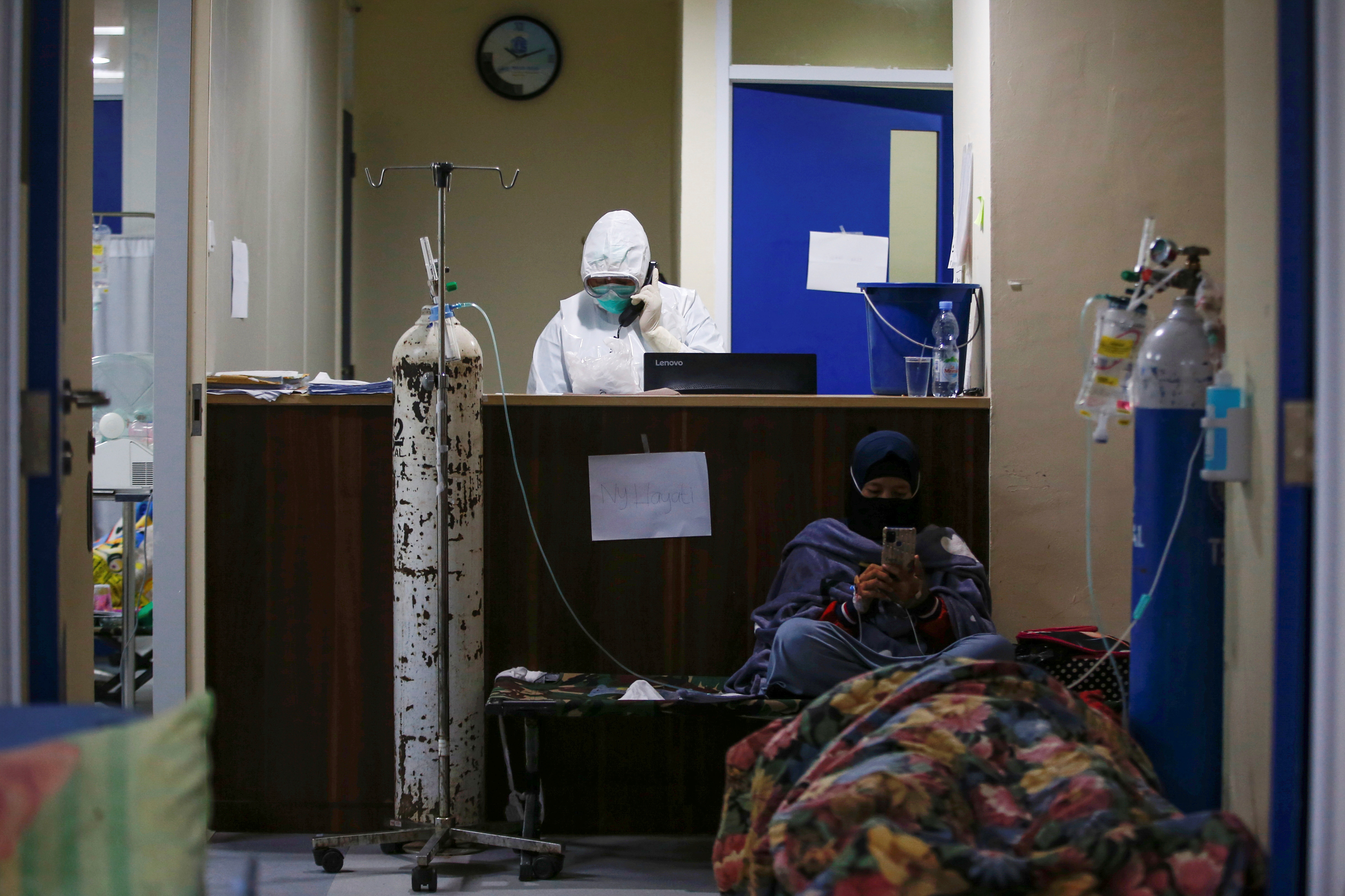 Emergency ward of a government-run hospital is busy as the cases of COVID-19 surge in Jakarta