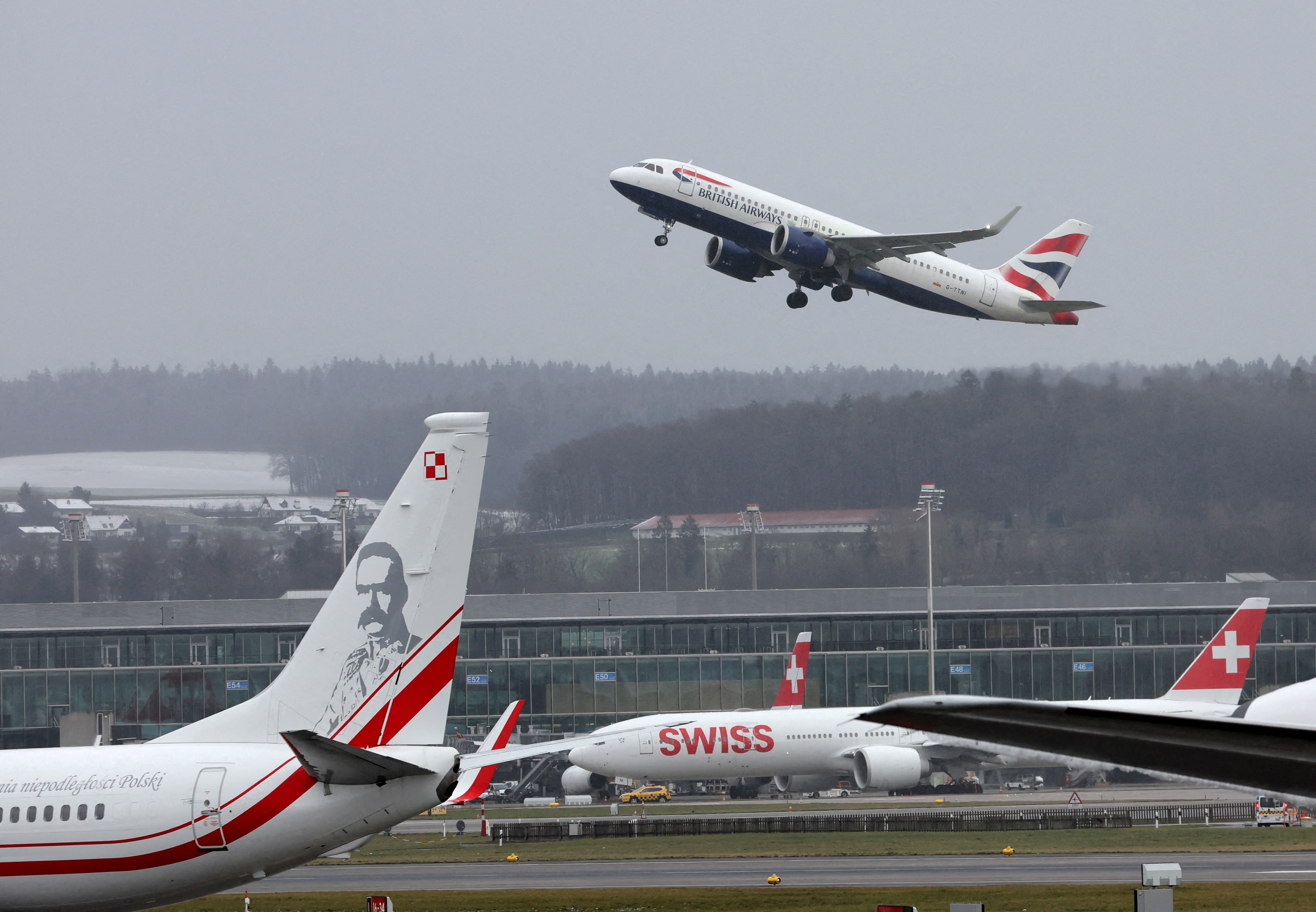 An Airbus A320 aircraft of British Airways takes off at Zurich Airport near Ruemlang