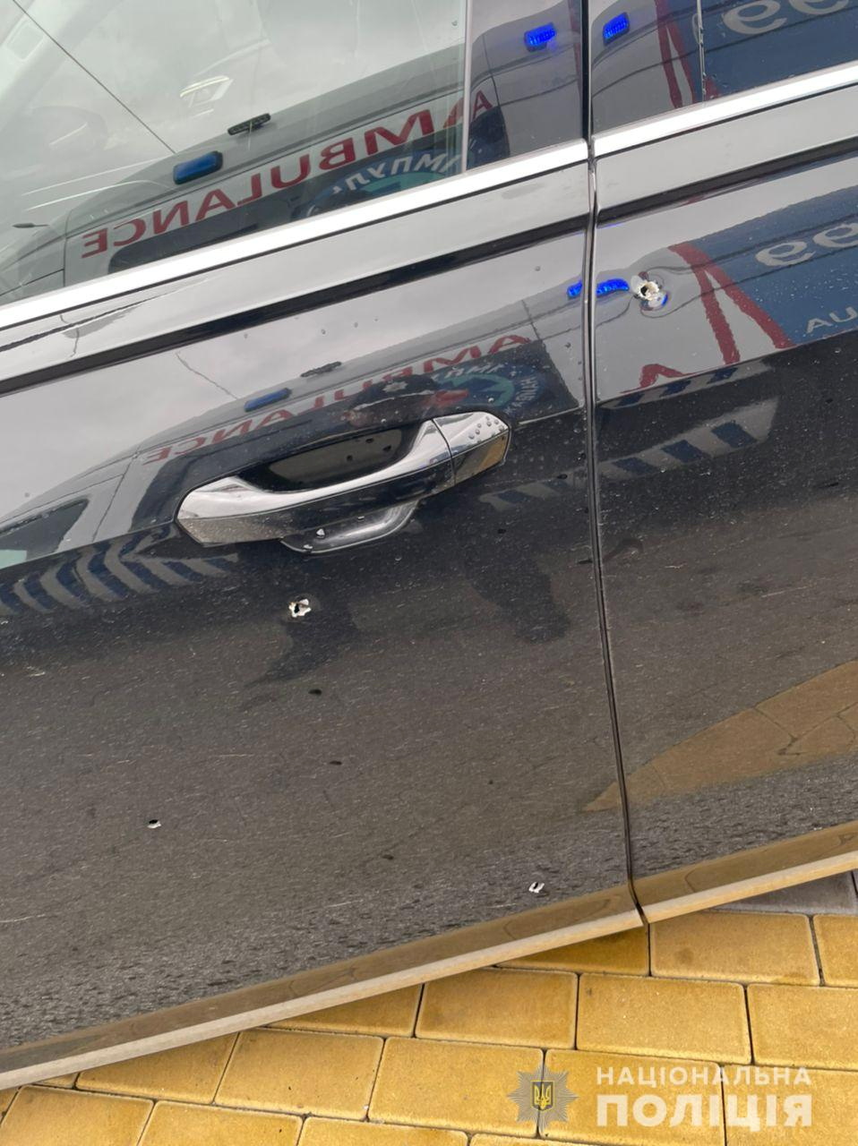 A view shows bullet holes in a car of presidential aide Serhiy Shefir following an assault outside Kyiv