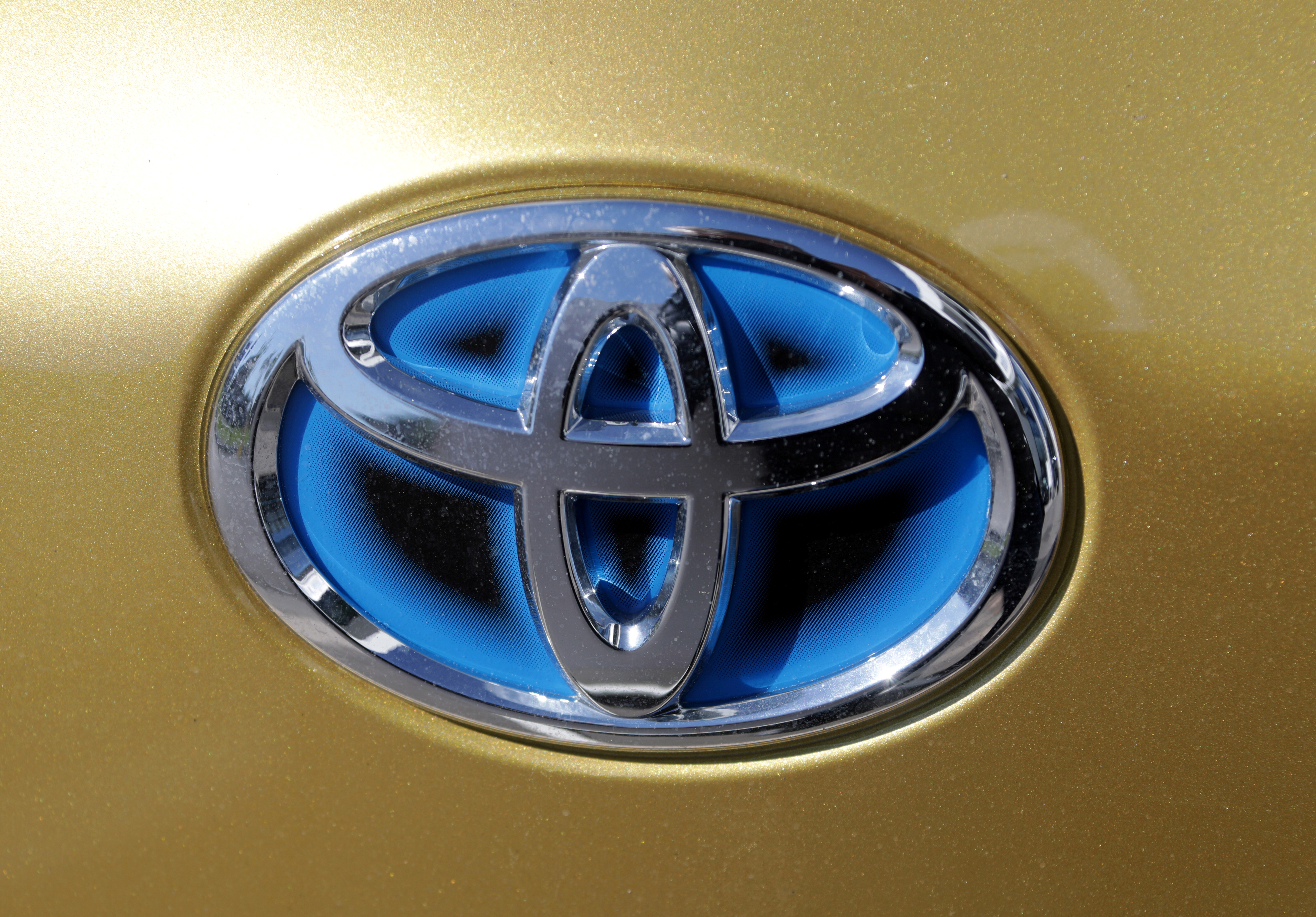 The logo of automaker Toyota is seen on a car in France