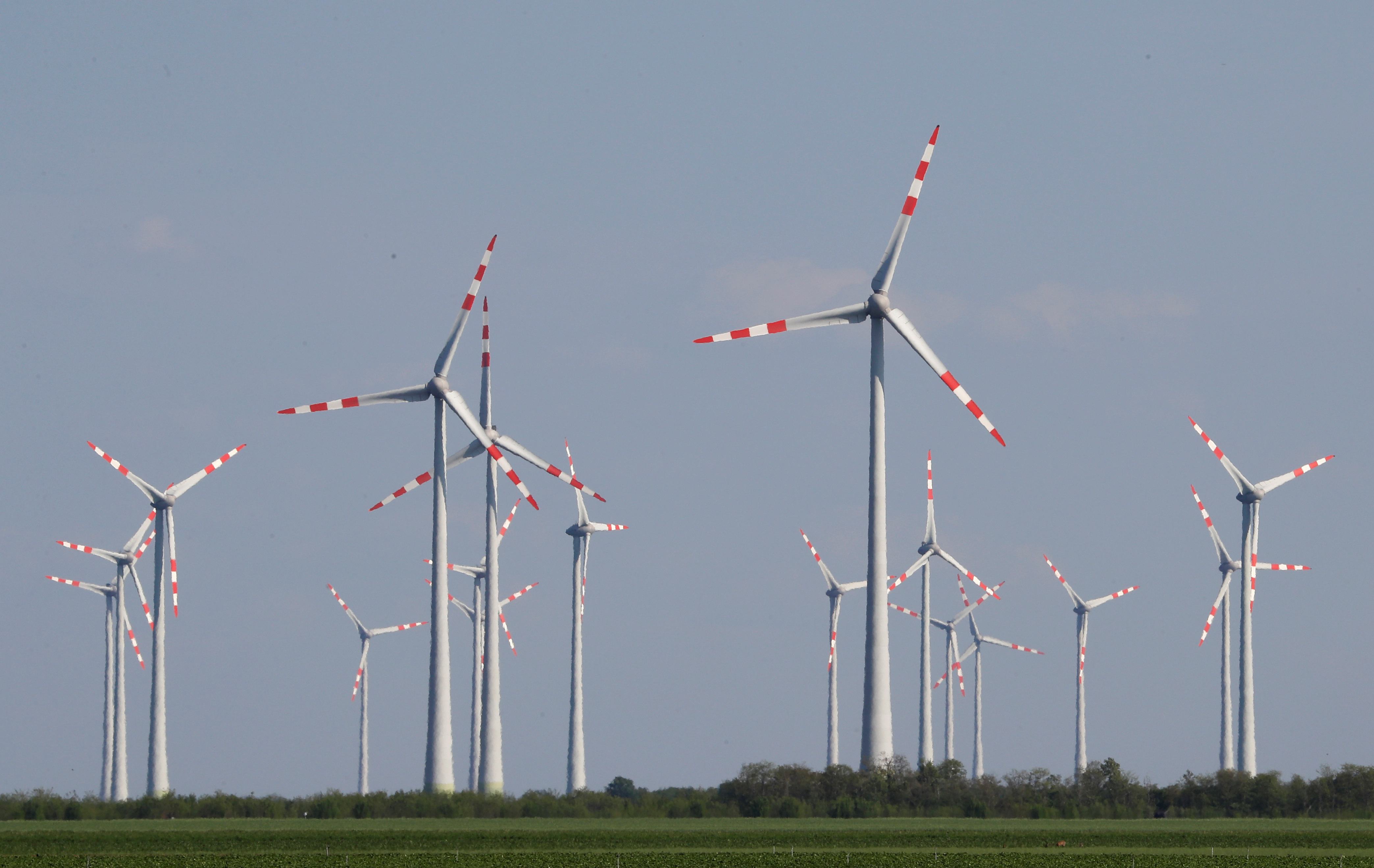 Power-generating windmill turbines are seen at a wind park near Andau