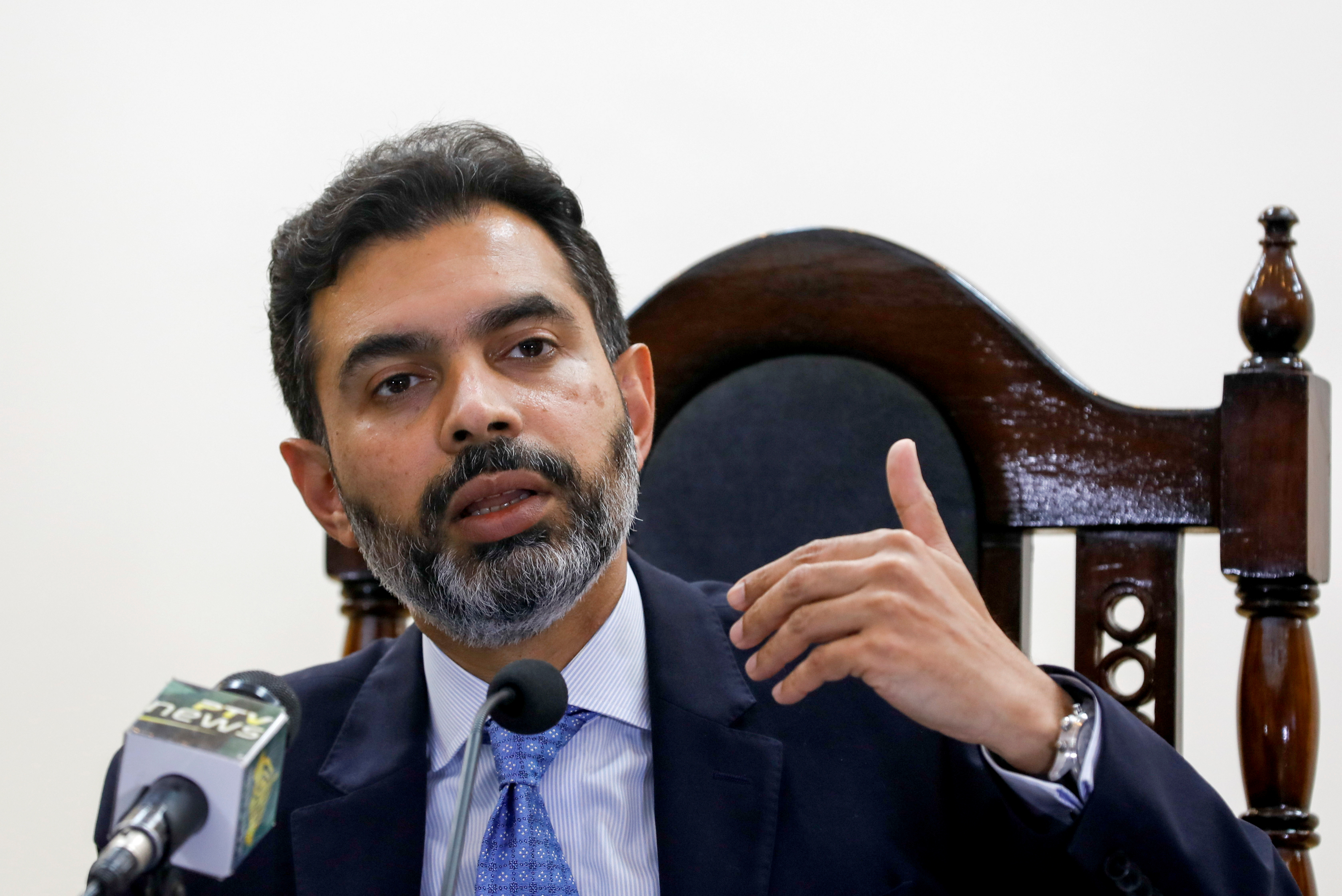 Reza Baqir, Governor of the State Bank of Pakistan (SBP), gestures during a news conference at the head office in Karachi, Pakistan January 22, 2021. REUTERS/Akhtar Soomro