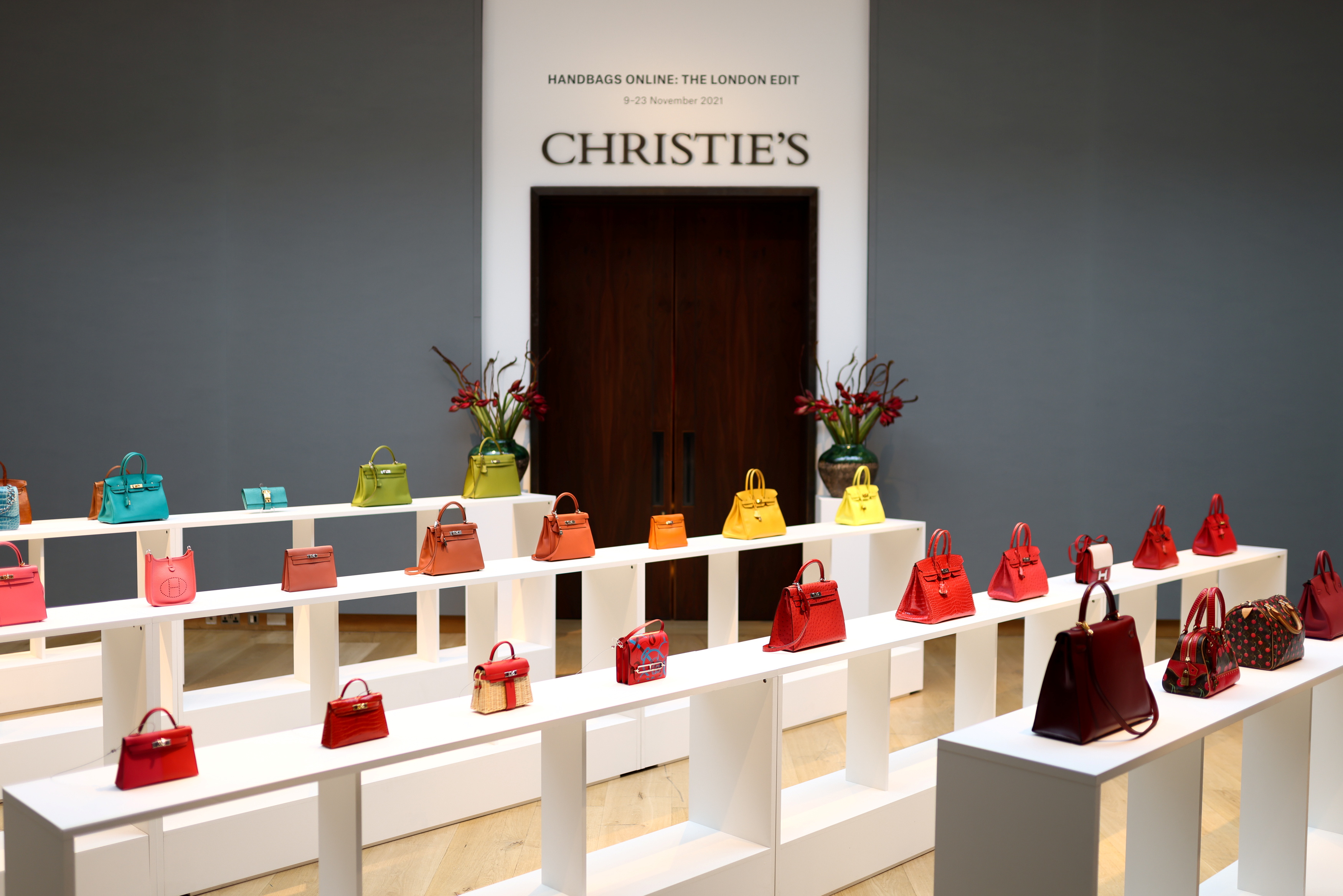 Cologne, Germany. 02nd Sep, 2021. Luxury handbags by Louis Vuitton, Chanel  and Hermes, Birkin Bag (front) and Mini Birkin (r), are on display at  Sotheby's new German branch. The auction house intends