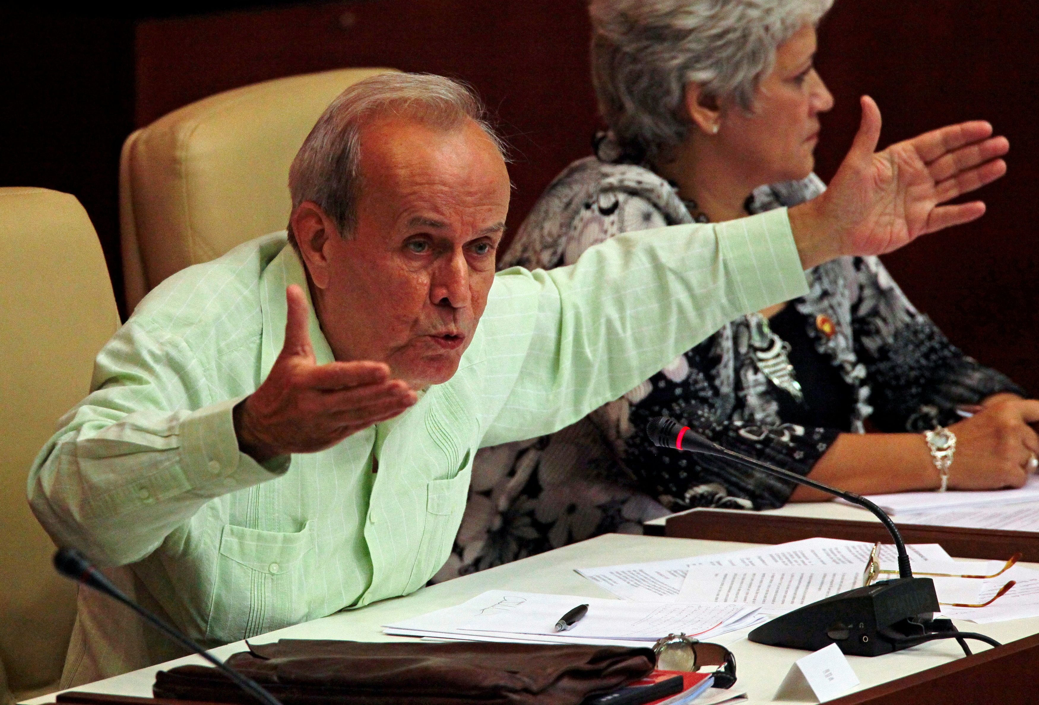 Cuba's National Assembly President Alarcon gestures during the bi-annual meeting in Havana