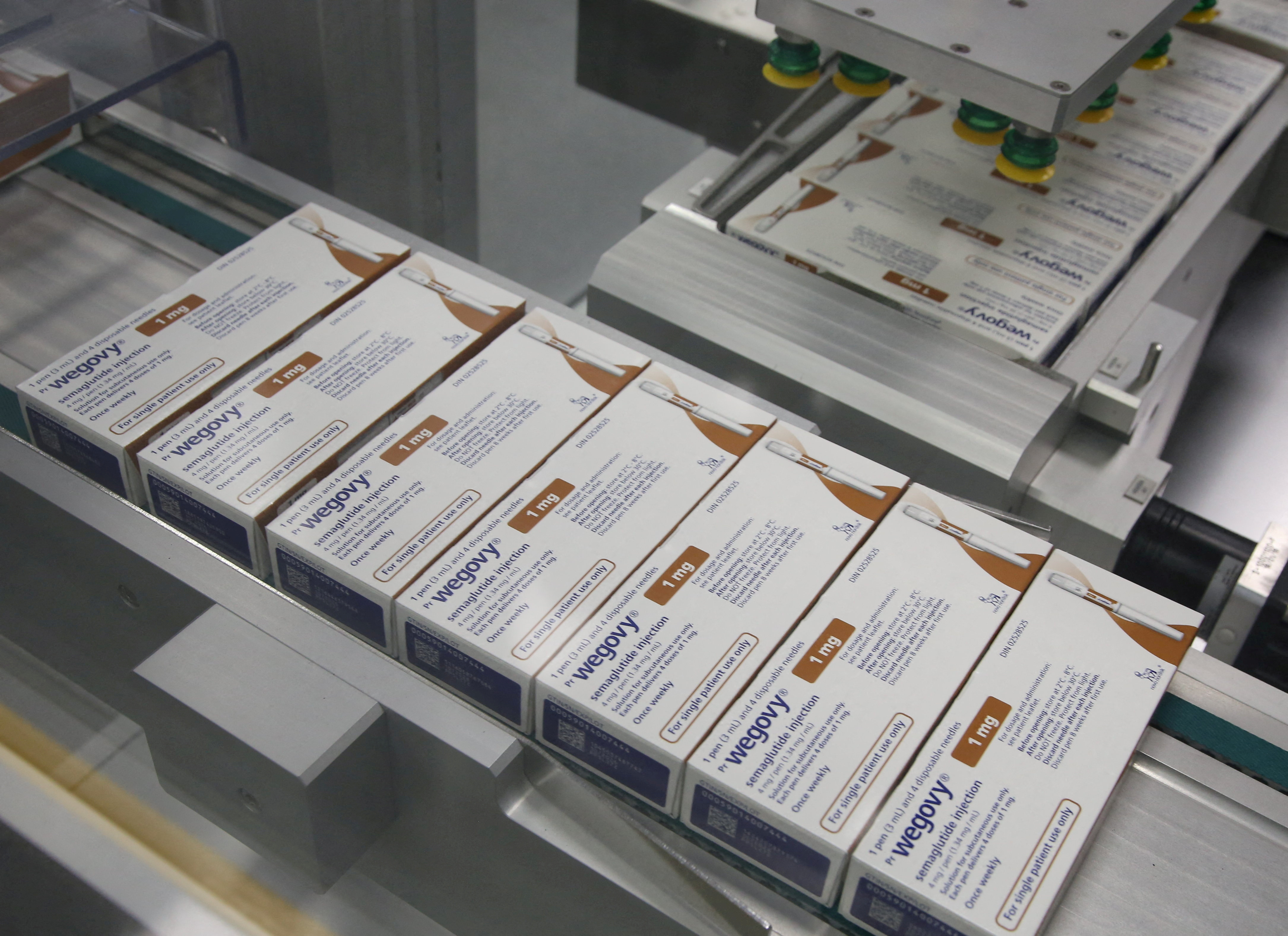 Boxes of Wegovy move along a packaging line at Novo Nordisk's facility in Hillerod