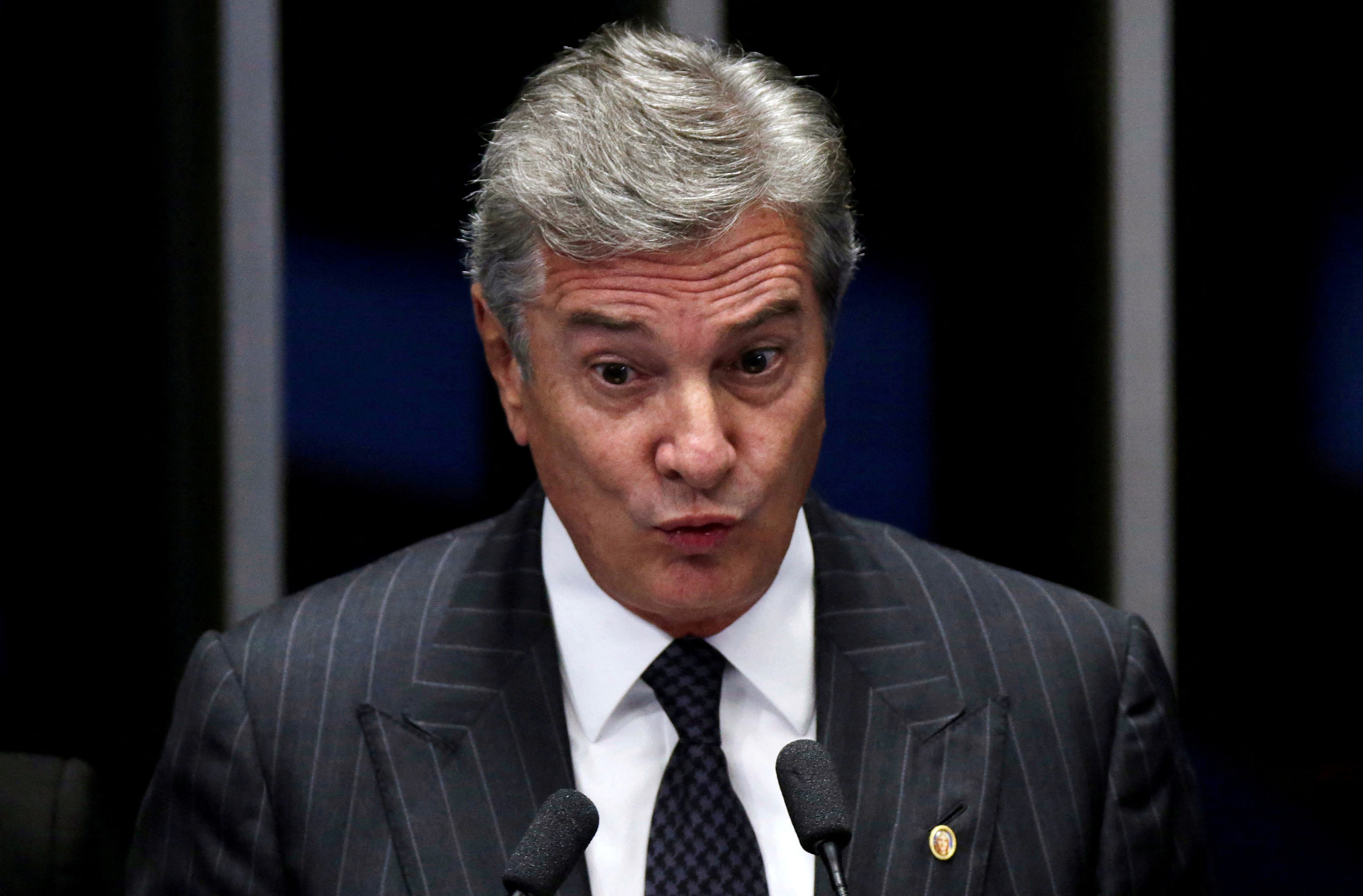 Senator Collor de Mello speaks during a vote session on the impeachment of President Dilma Rousseff in Brasilia