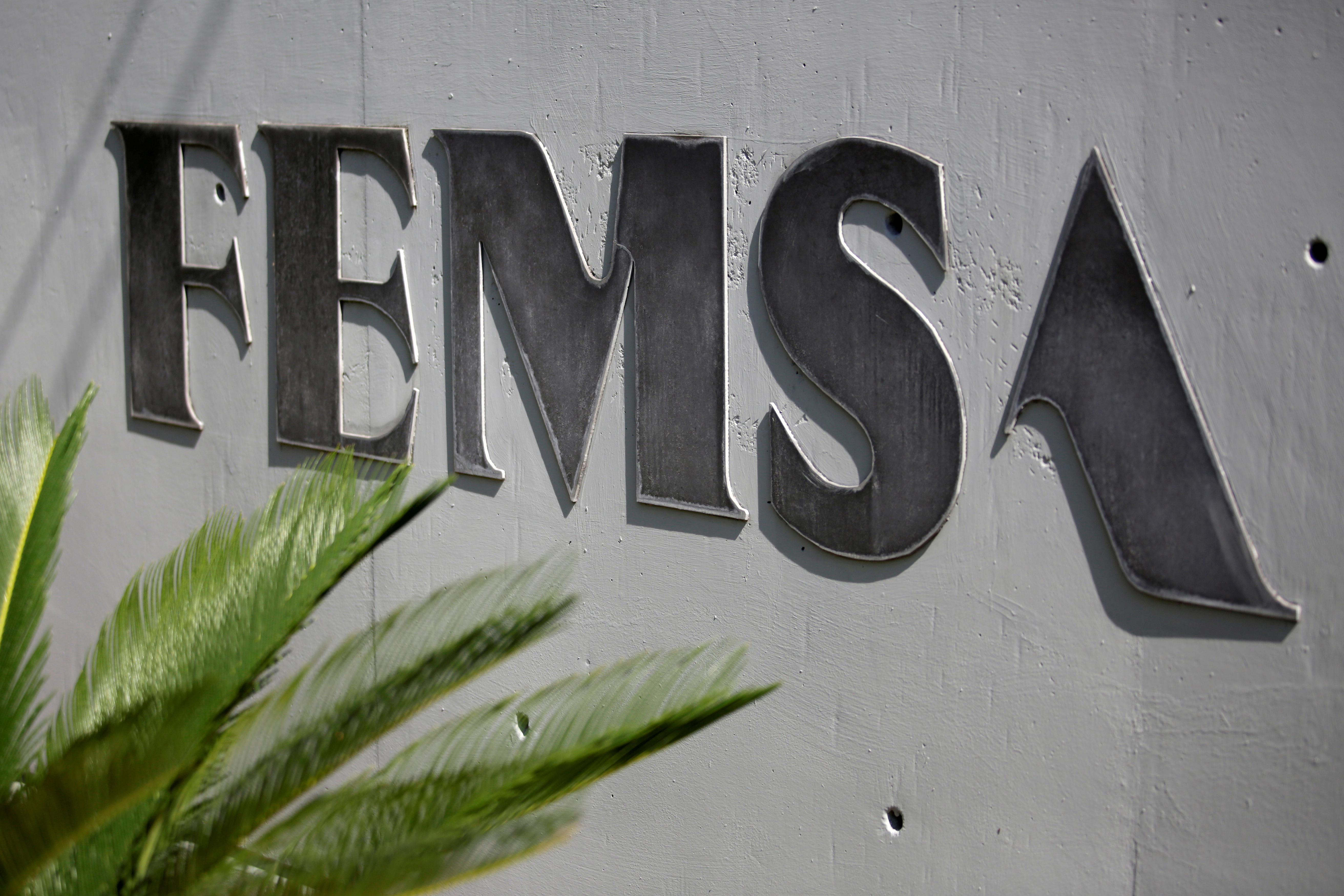 The logo of Mexico's Coca-Cola FEMSA, the world's biggest Coke bottler, is pictured at its headquarters in Monterrey