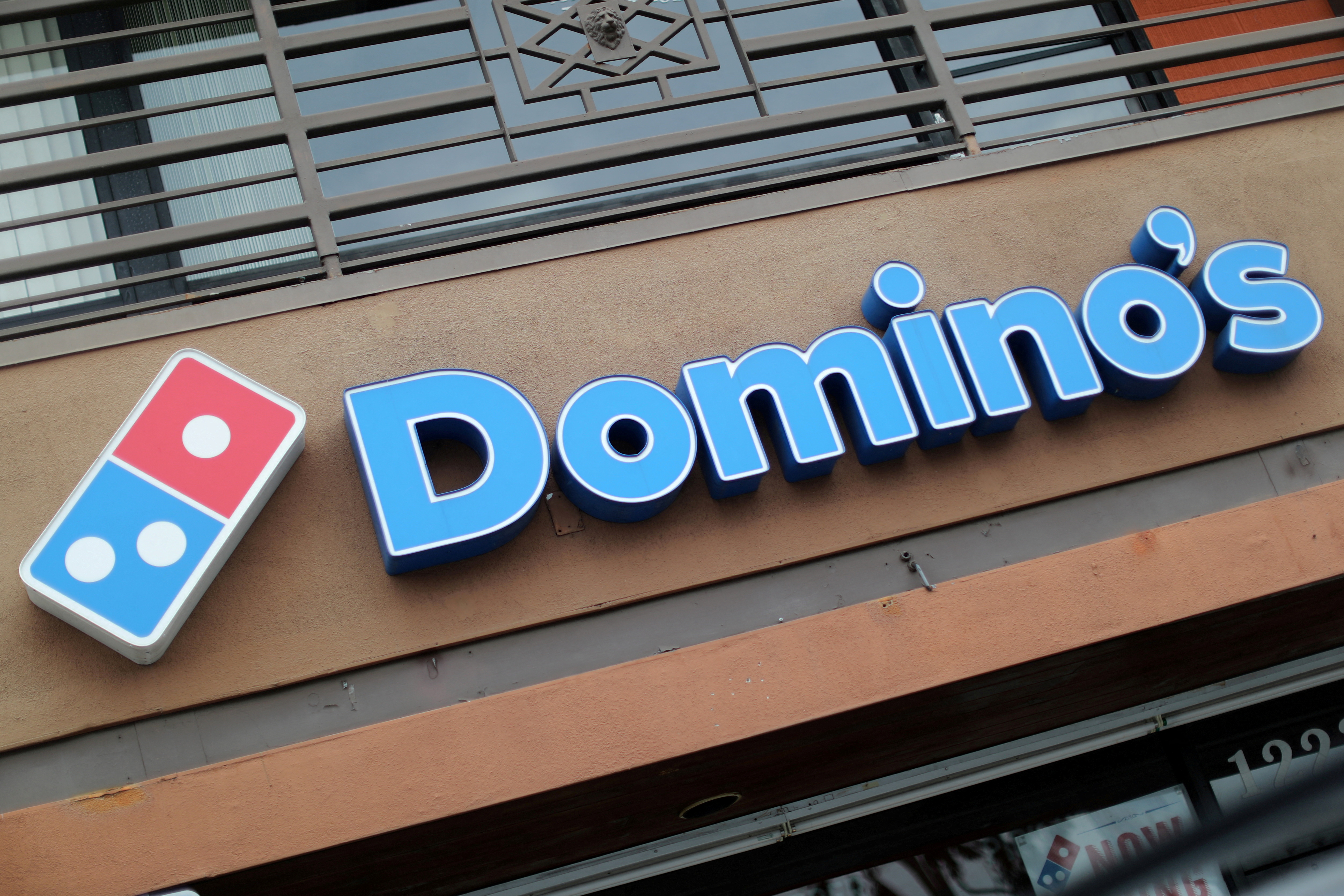 Why did dominos leave south africa?