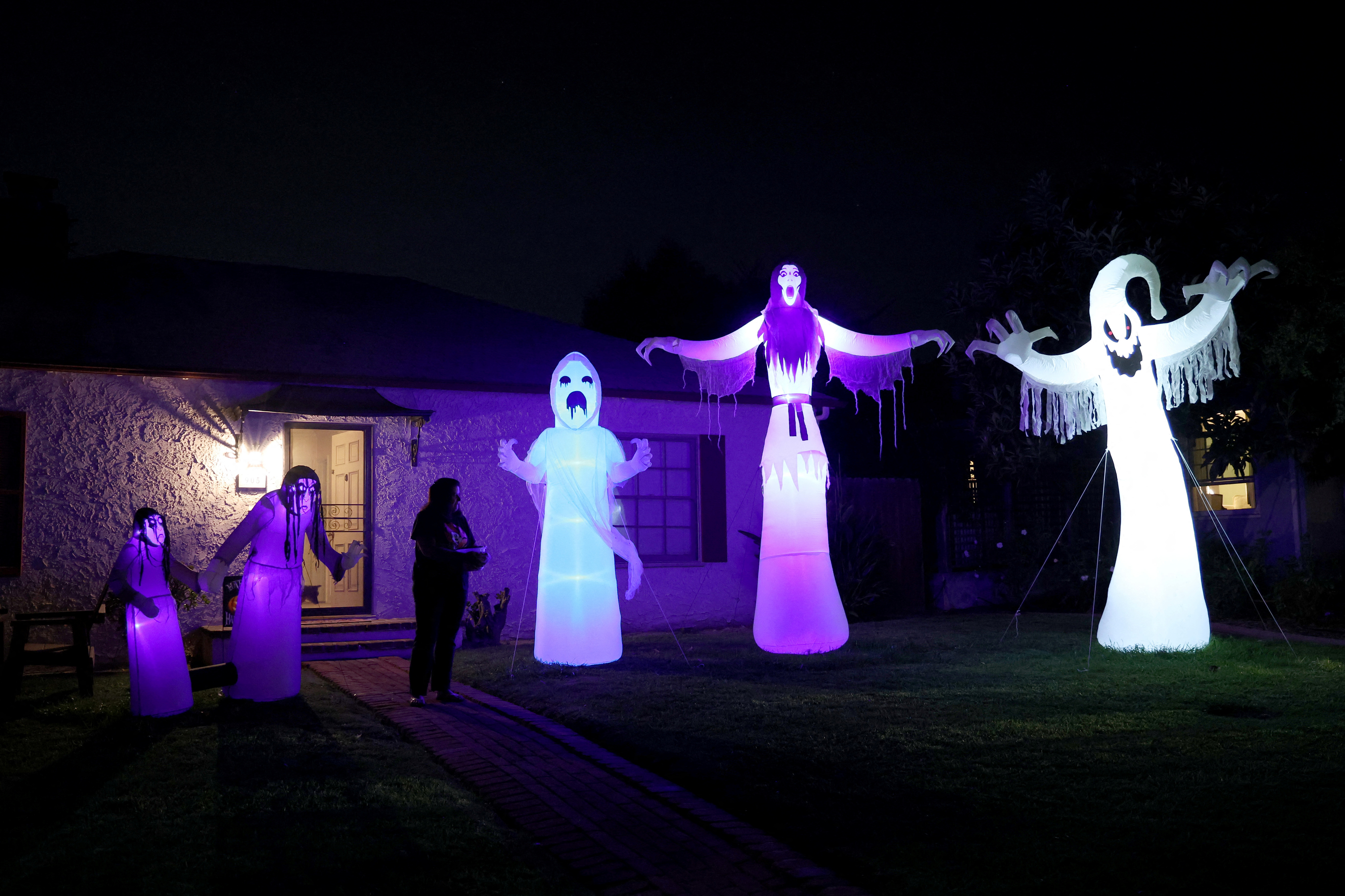 Revelers around the world dress up for Halloween - November 1