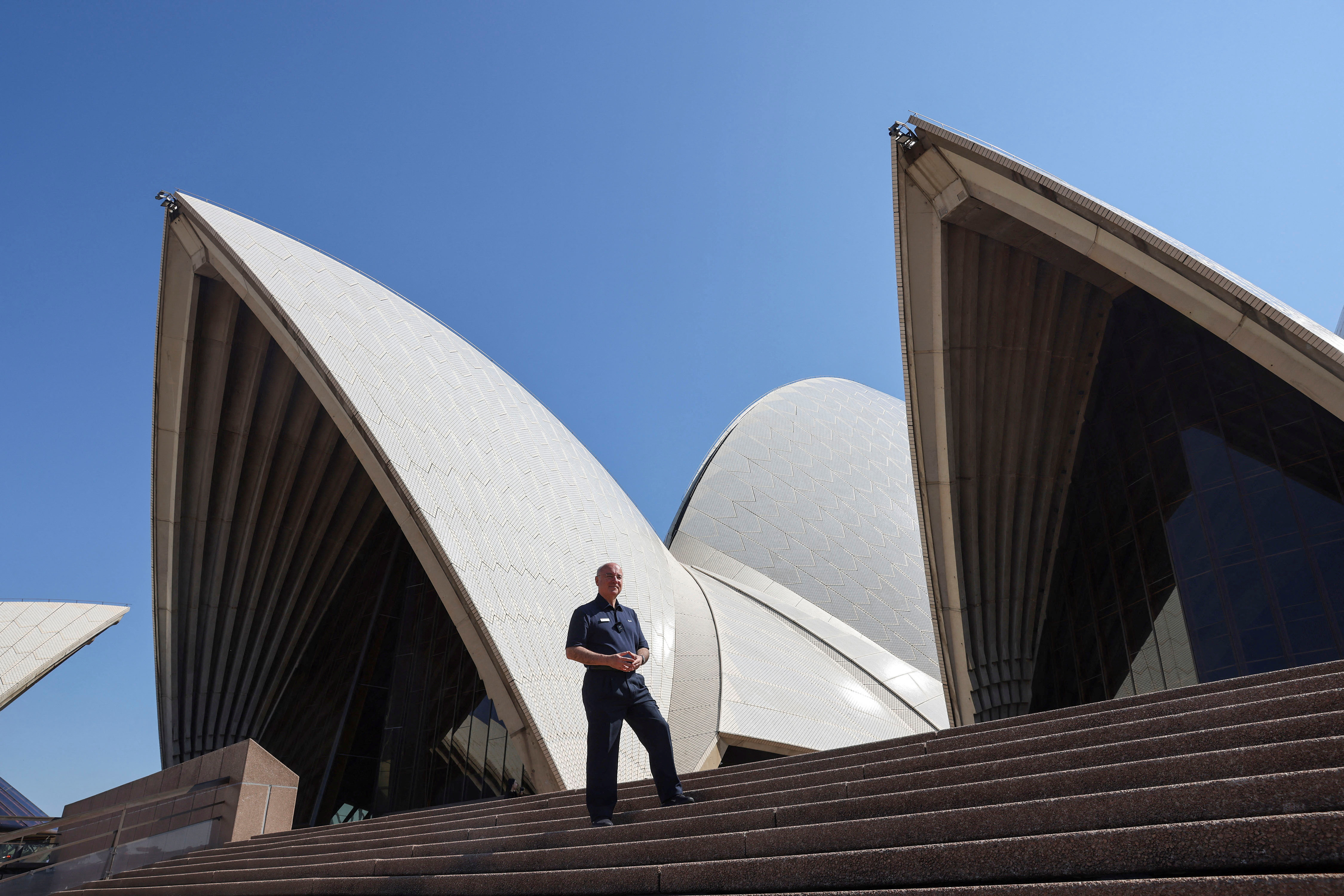 Former architect Peter Sekules poses at the Sydney Opera House