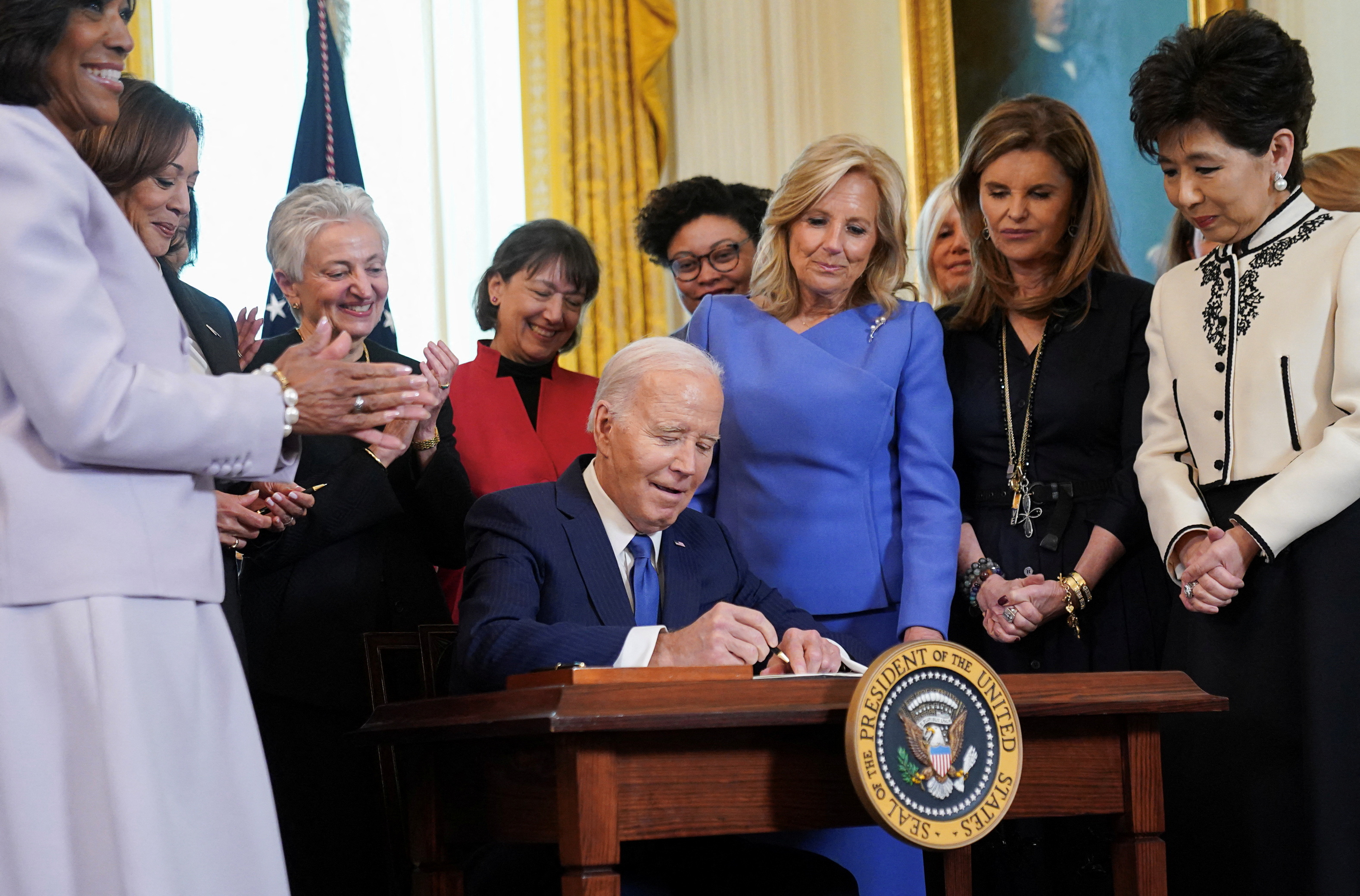 The Bidens host a Women’s History Month reception at the White House in Washington