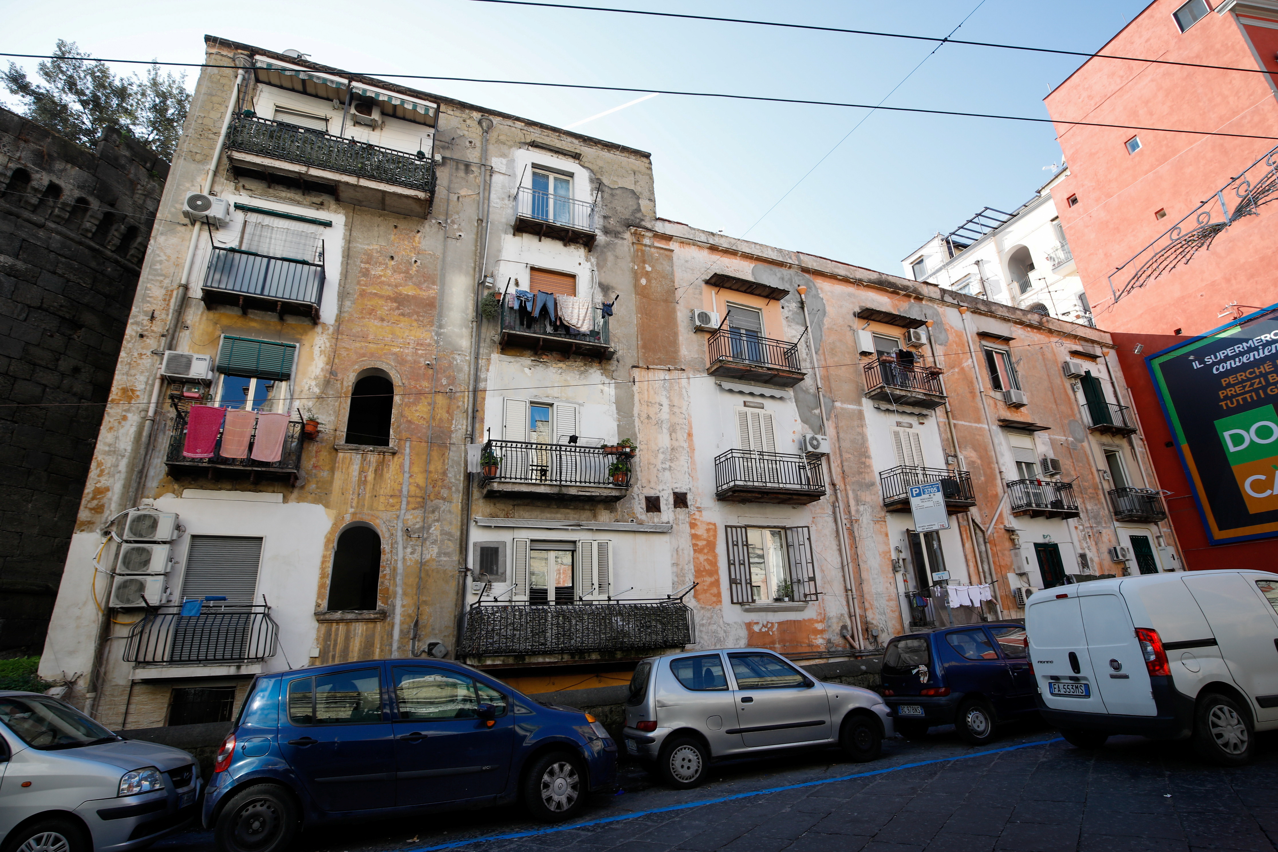 A dilapidated building is seen in Naples