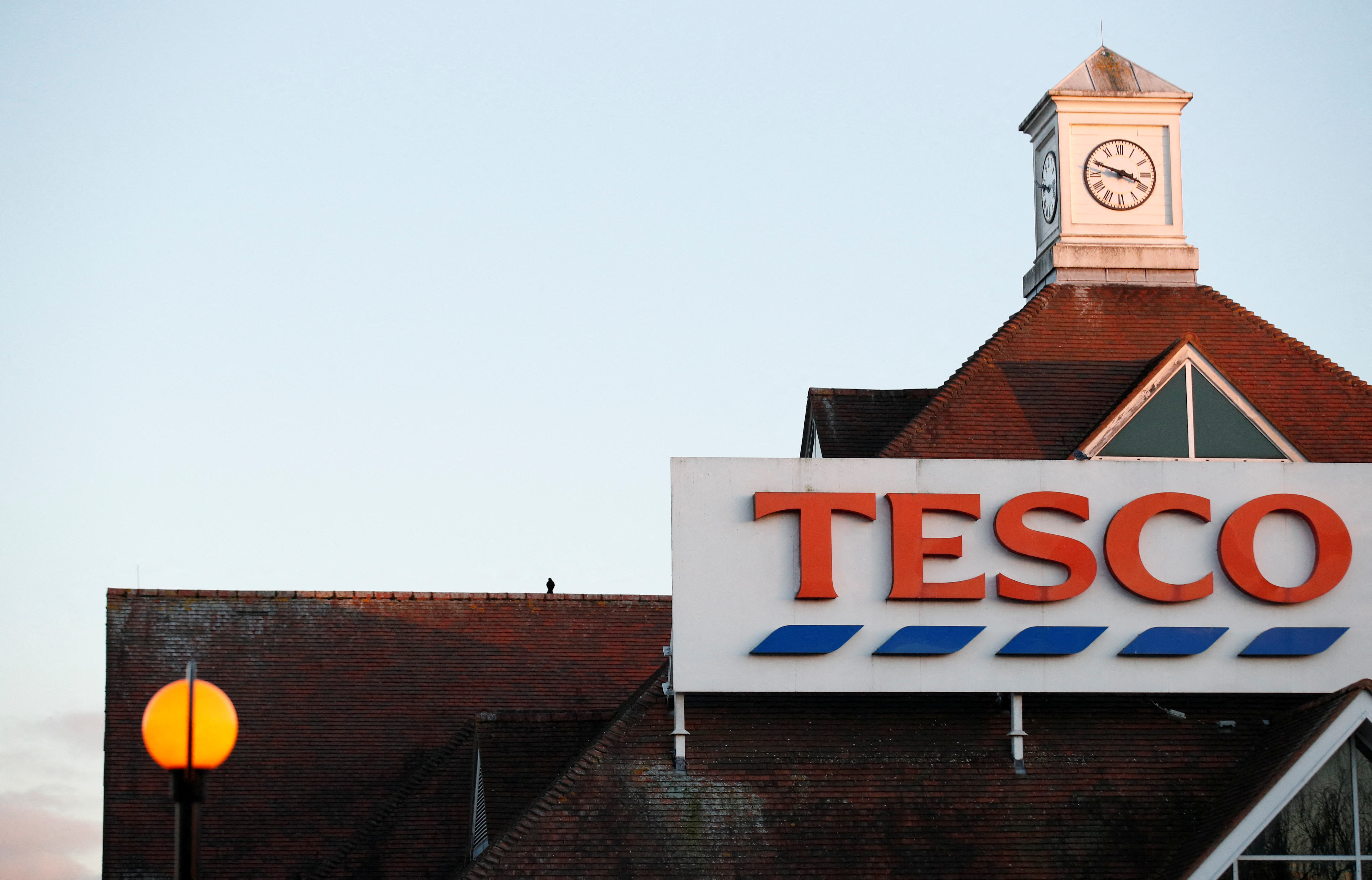 As Britons target cheaper food, Tesco cuts branded products in