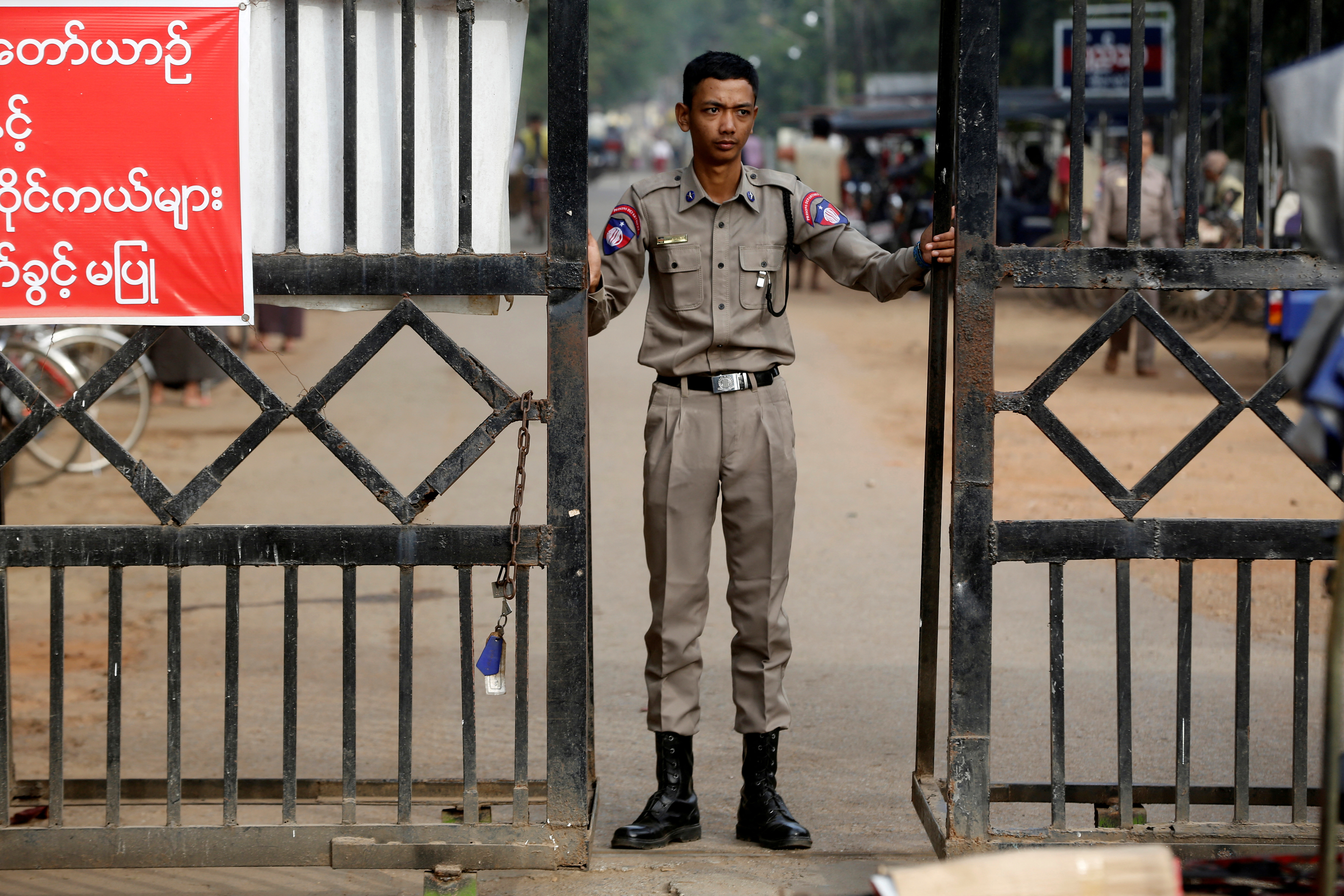 A member of staff stands guard at Insein prison in Yangon